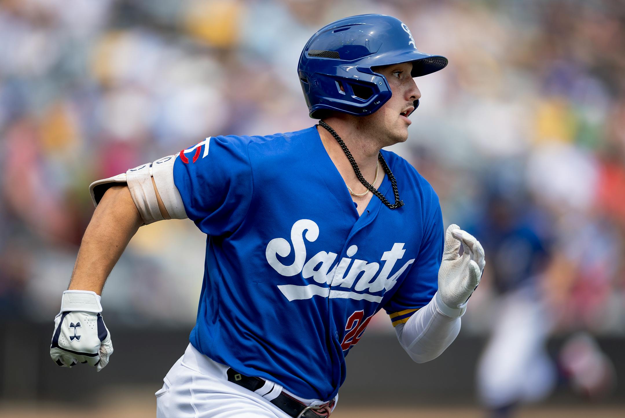 St. Paul Saints infielder Brooks Lee rounds first base after hitting an RBI single Wednesday, August 9, 2023, at CHS Field in St. Paul, Minn.