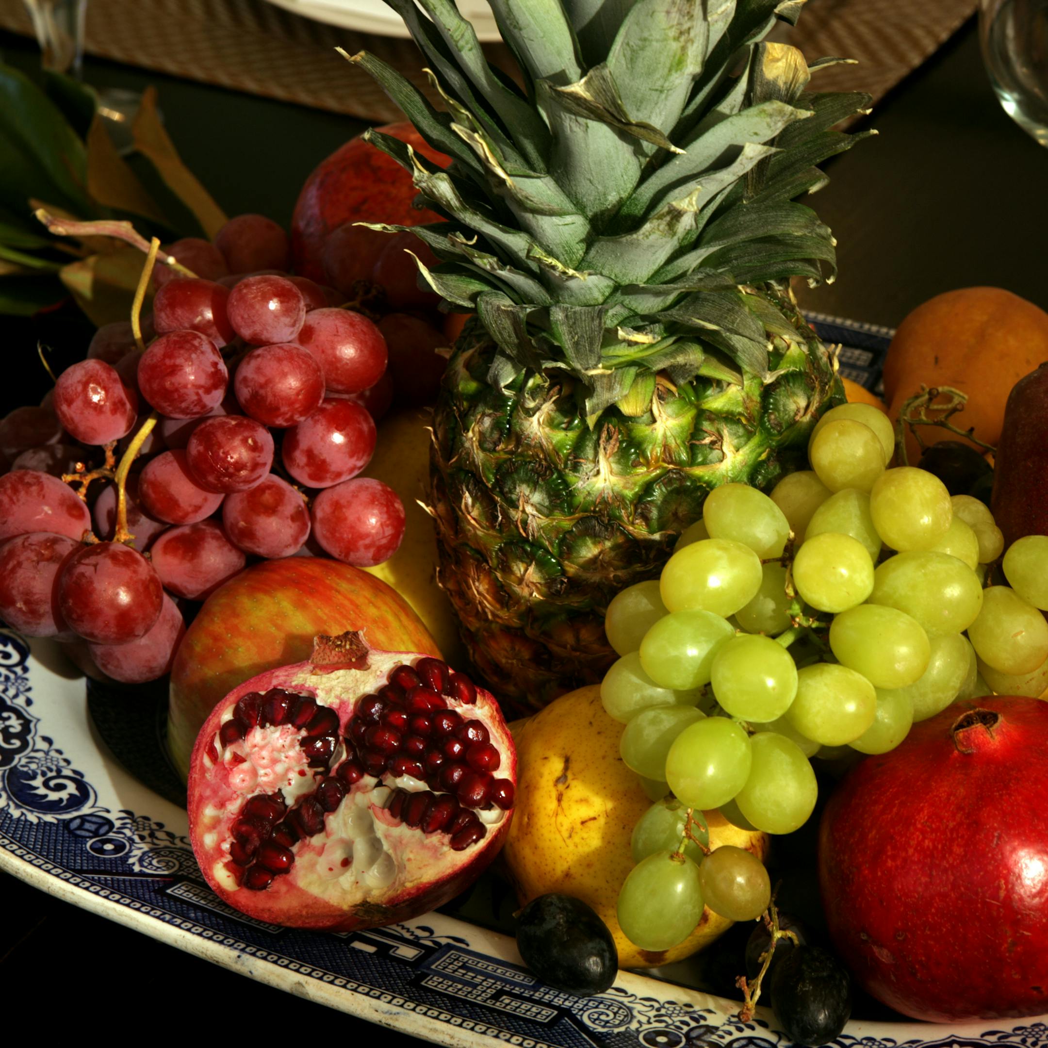 joel koyama‚Ä¢joel.koyama@startribune.com homi1211 20010296a :] Tom Taylor (left) and Tom Garrett of Minneapolis, MN decorated their home for a New Years party. The center piece on the diningroom table consisted of an edible arraingement created by tom Garrett and Tom Taylor.