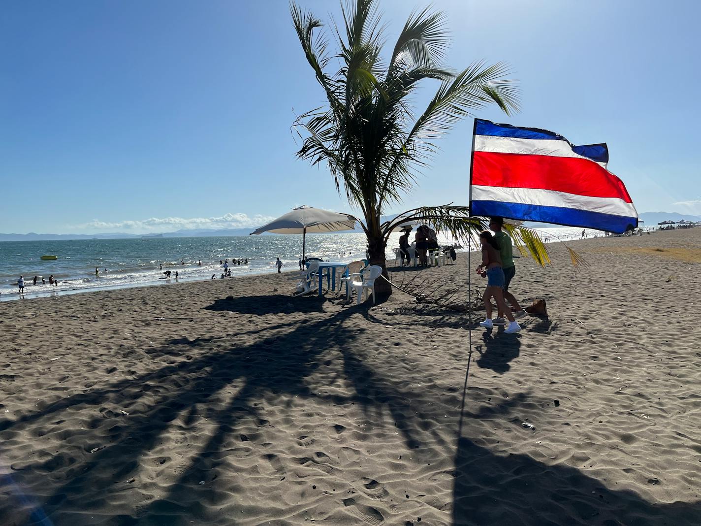 A Costa Rican flag flutters on the beach in downtown Puntarenas. MUST CREDIT: Washington Post photo by Mary Beth Sheridan.