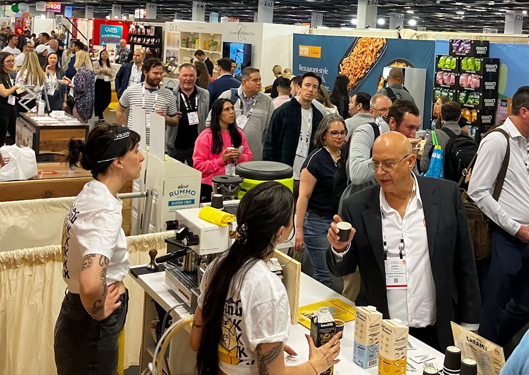 Expo West attendees walk through a crowded exhibition hall packed with food brands from around the world trying to catch the attention of retailers and investors.