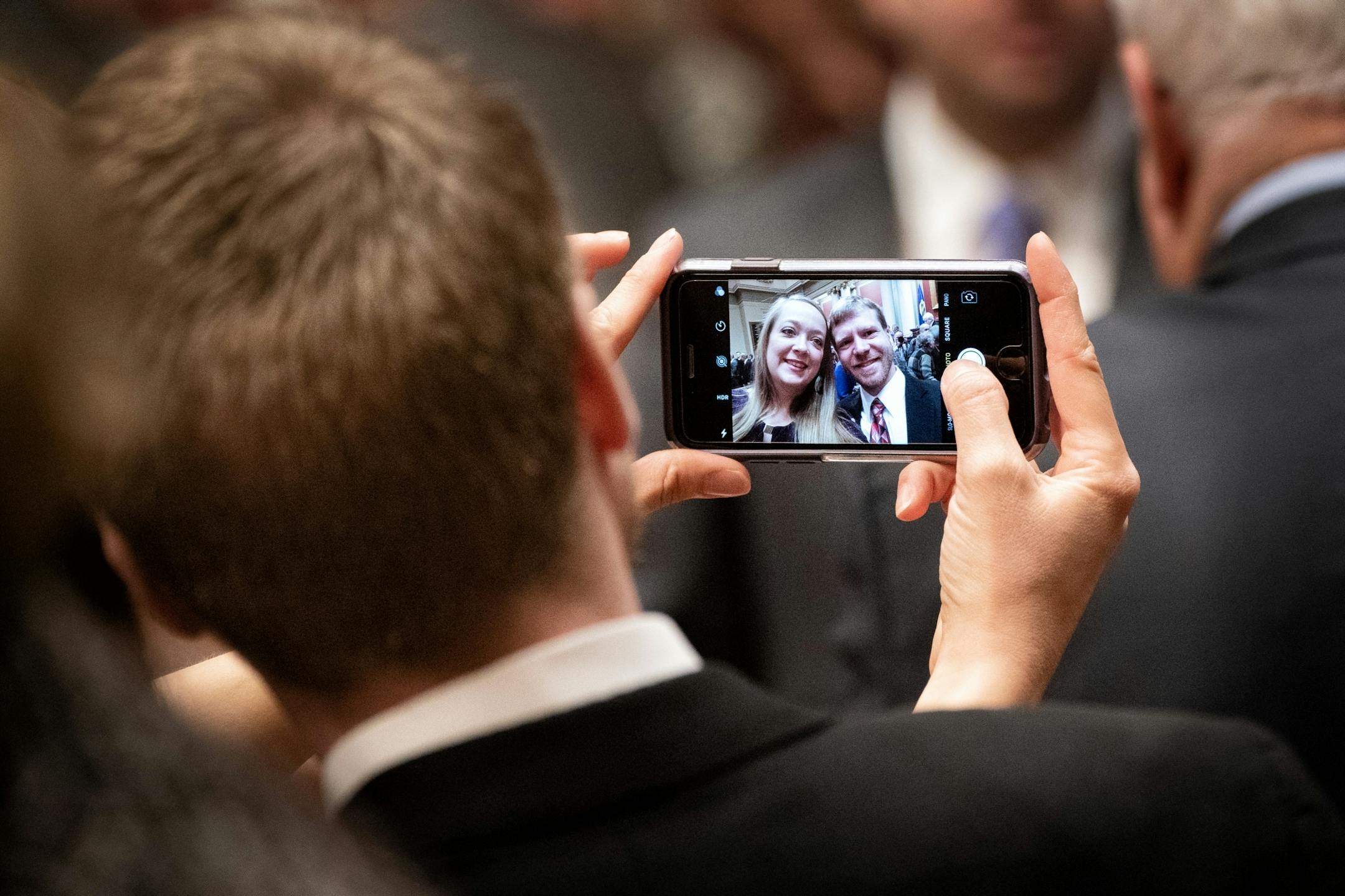 Rep. Ben Lien, DFL-Moorhead took a selfie on the House Flor with his girlfriend Sarah Cook.