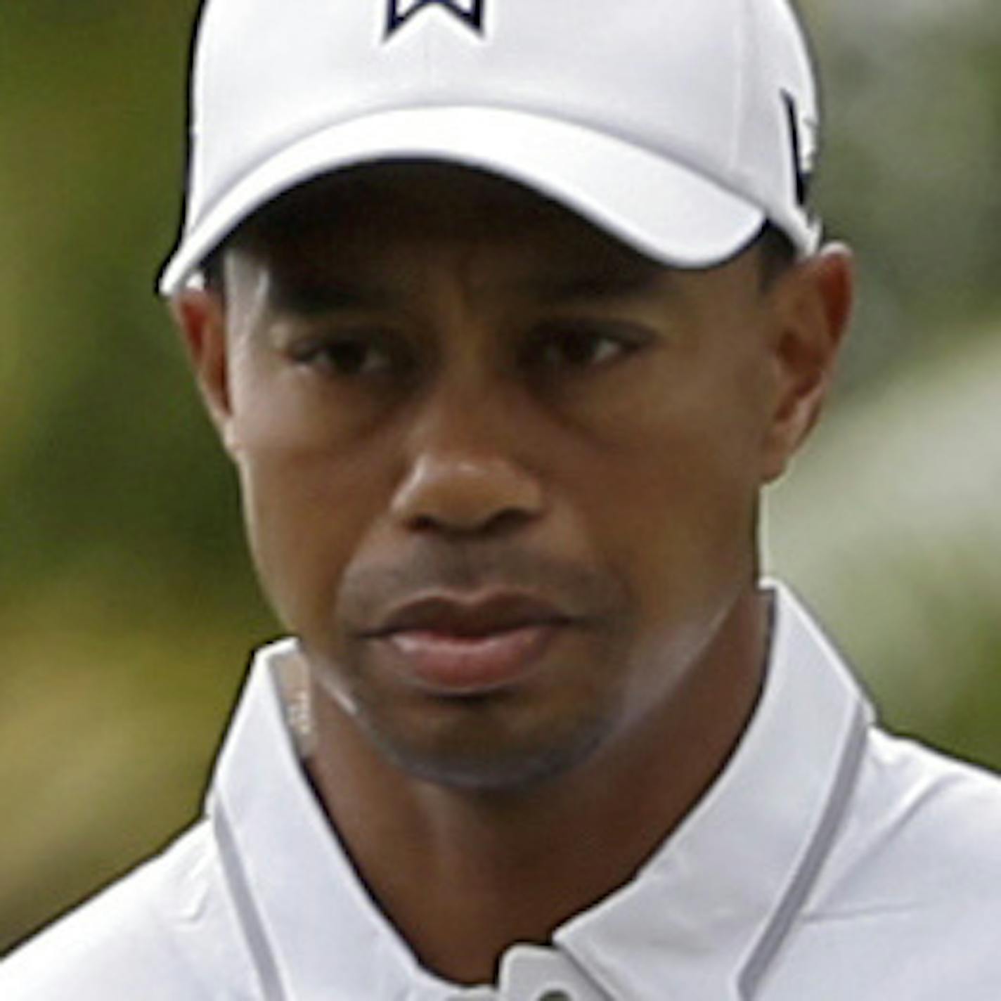 Tiger Woods heads to the 12th tee during a practice round at the Cadillac Championship golf tournament in Doral, Fla., Wednesday March 6, 2013. (AP Photo/Alan Diaz)