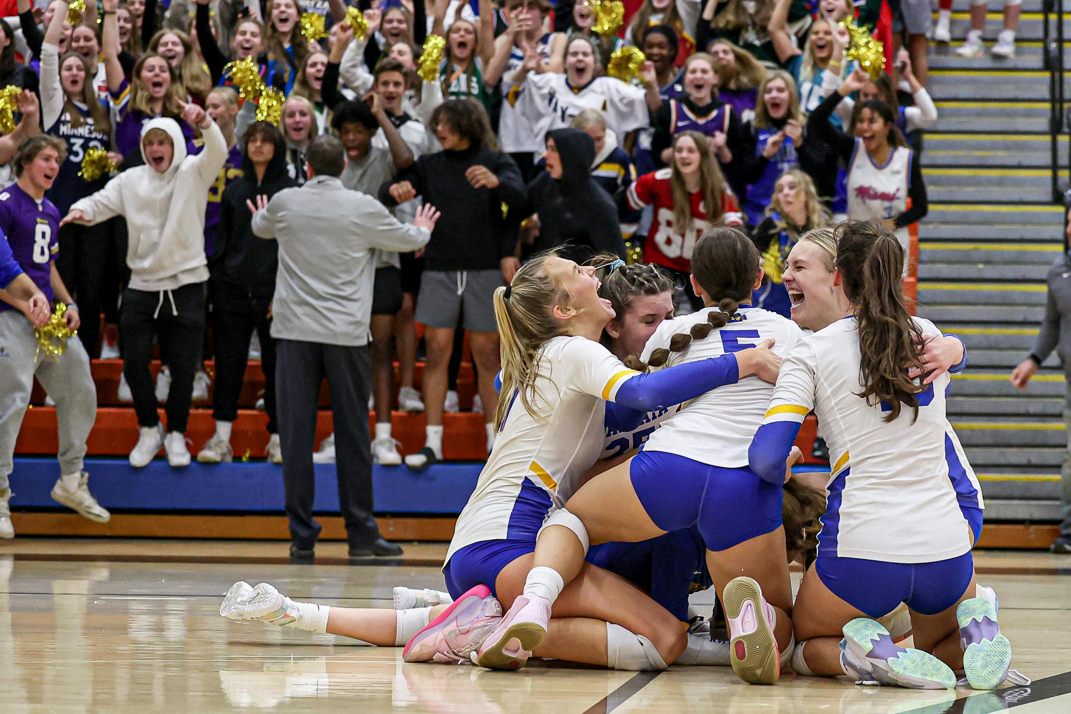 Wayzata players celebrated the match-winning point in a 3-1 victory over Champlin Park. Class 4A Section 5 volleyball final at Osseo, Champlin Park vs. Wayzata, 11-02-22. Photo by Mark Hvidsten, SportsEngine