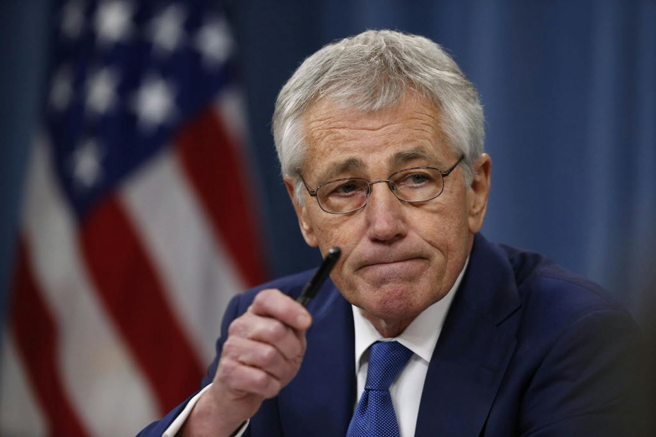 Defense Secretary Chuck Hagel takes questions as he briefs reporters at the Pentagon in Washington, Thursday, Dec. 19, 2013.