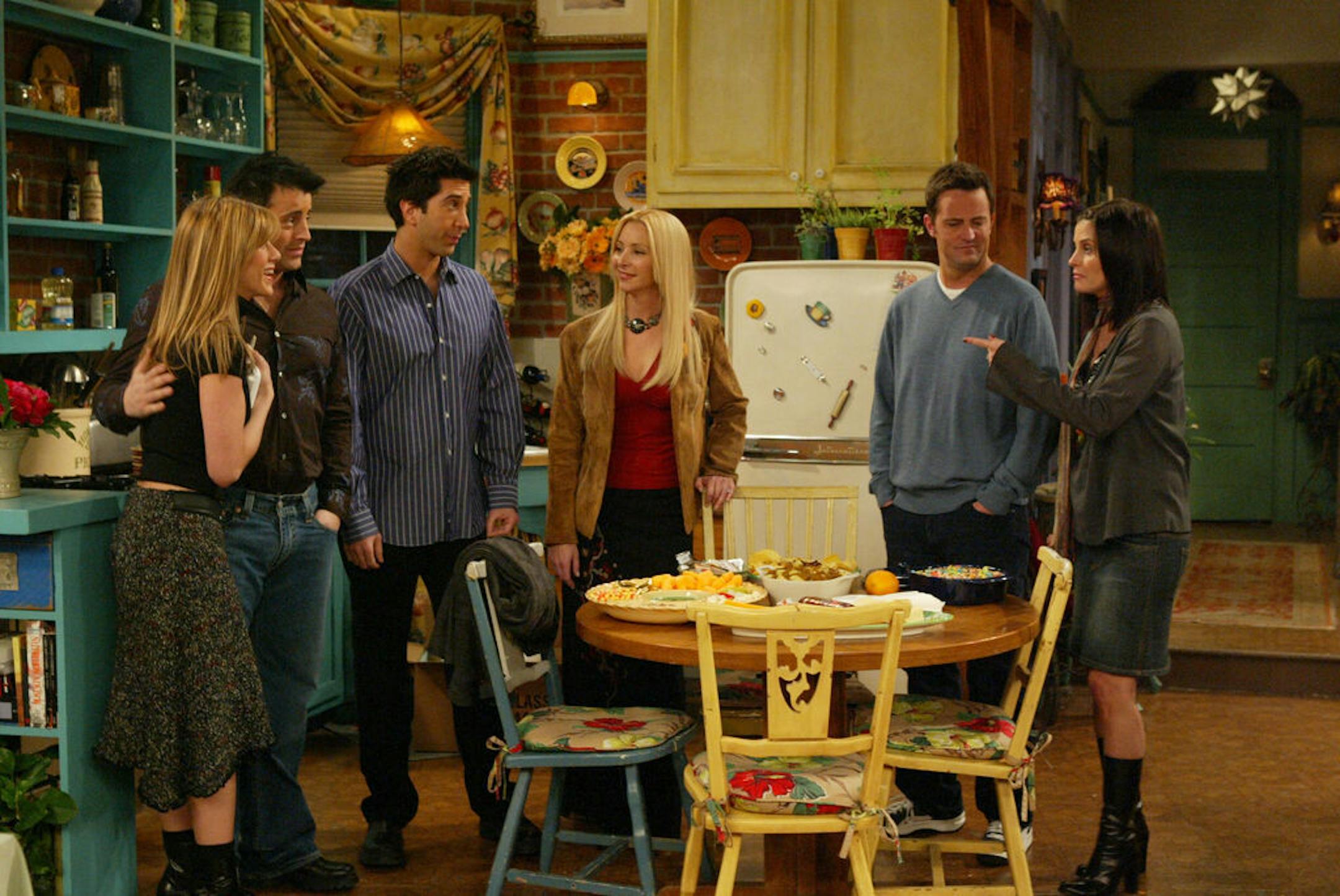 FRIENDS — NBC Series — Season 10: "The One With Rachel's Going Away Party" — Pictured: (l-r) Jennifer Aniston as Rachel Green, Matt Le Blanc as Joey Tribbiani, David Schwimmer as Ross Geller, Lisa Kudrow as Phoebe Buffay, Matthew Perry as Chandler Bing, Courteney Cox Arquette as Monica Geller Bing — Warner Bros. Photo.