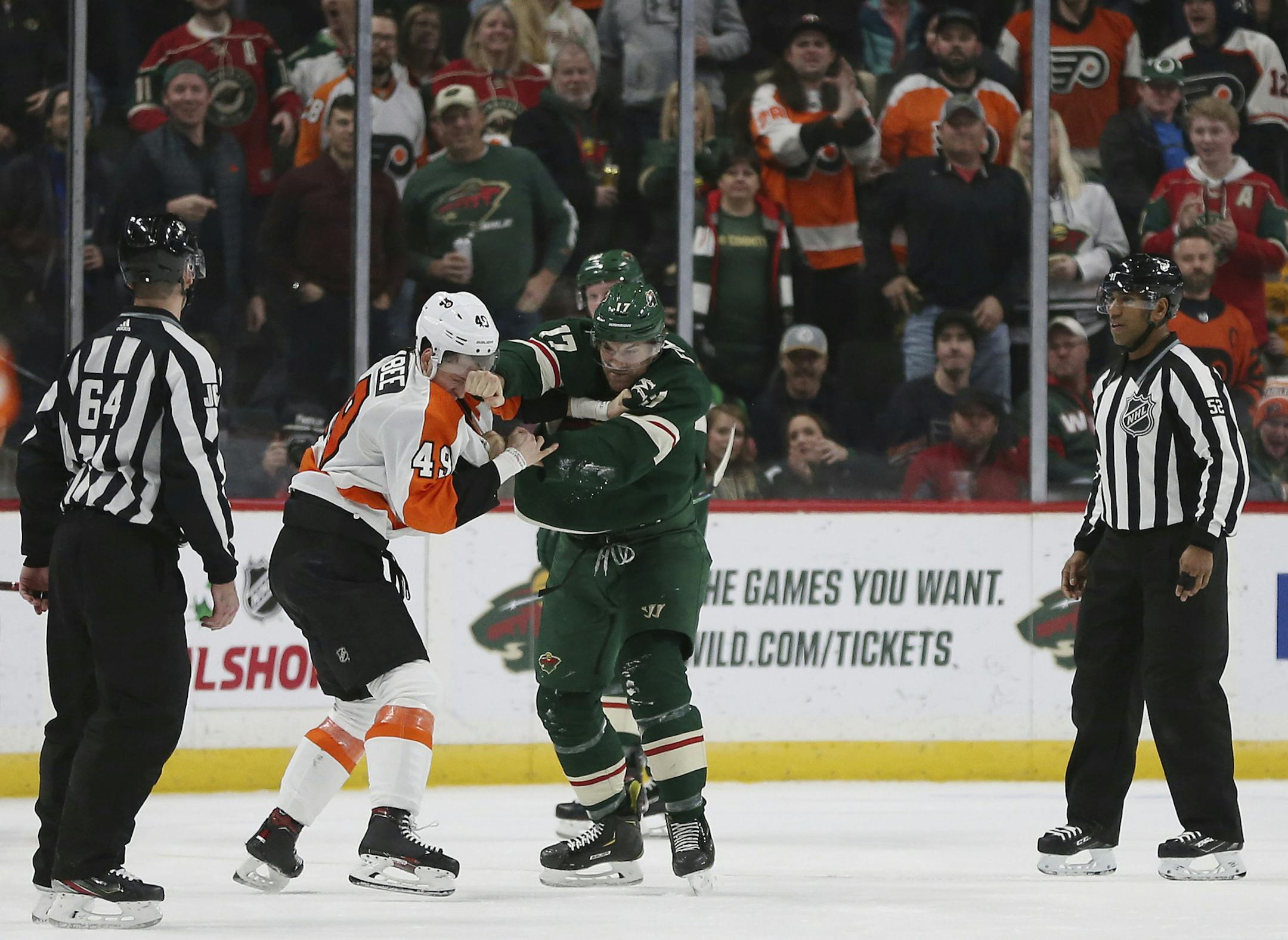 Minnesota Wild's Marcus Foligno fights Philadelphia Flyers' Joel Farabee in the second period of an NHL hockey game Saturday Dec. 14, 2019, in St. Paul, Minn. (AP Photo/Stacy Bengs)