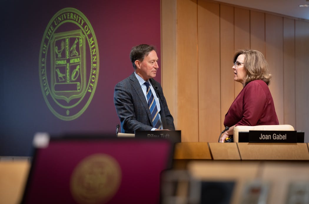 Former Hormel CEO Jeff Ettinger, who has been picked to serve as interim president of the University of Minnesota, talked with outgoing President Joan Gabel after a recent Board of Regents meeting in May.