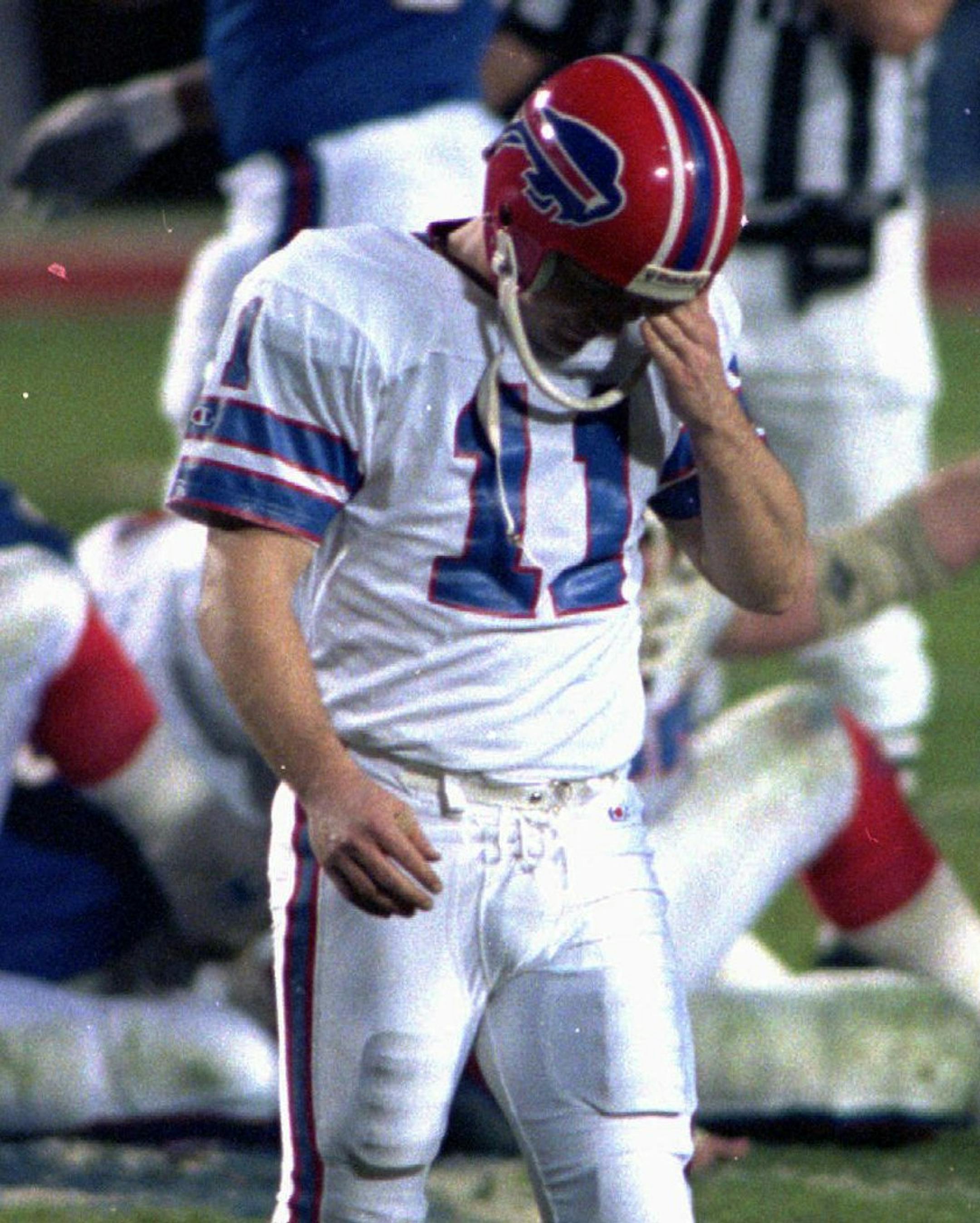 Scott Norwood of the Buffalo Bills walks dejectedly off the field after missing what would have been the game-winning field goal in Super Bowl XXV, Jan.27, 1991 in Tampa. Buffalo lost to the New York Giants, 20-19.(AP Photo/Chris O'Meara) ORG XMIT: TPS135