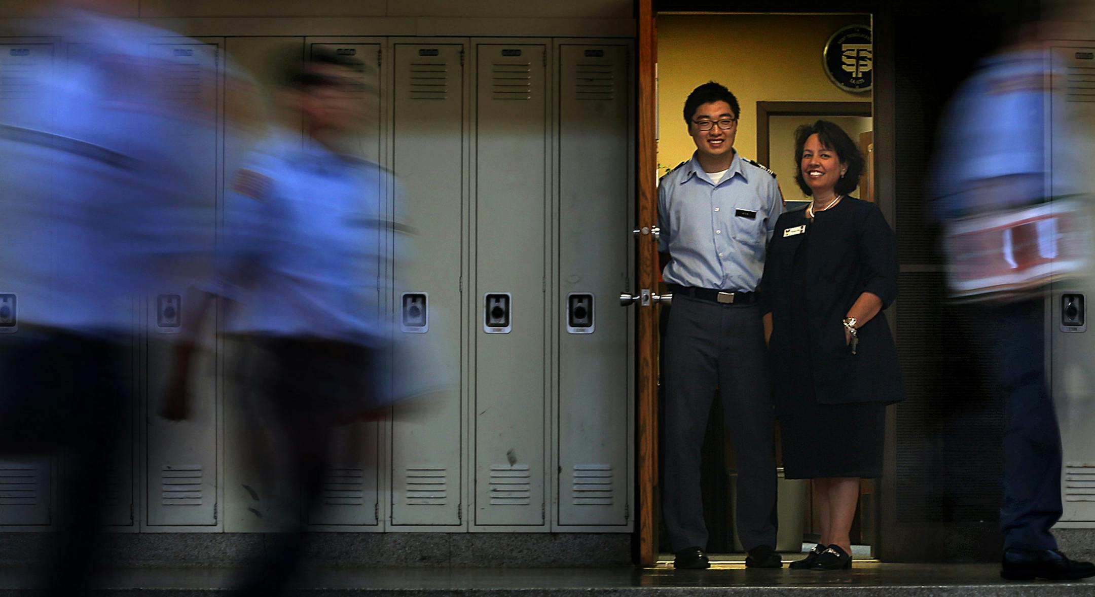 Peggy Mansur works in the admissions office at St. Thomas Academy, where she has been invaluable in assisting Don Kim, a student from South Korea, through many challenges.