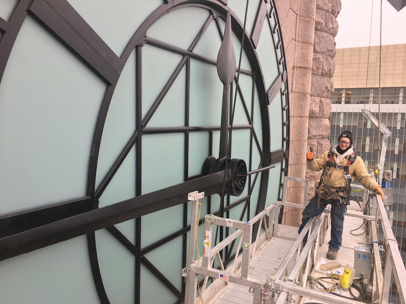 A construction worker outside the east face of the Minneapolis City Hall clock tower on Jan. 24, 2017.