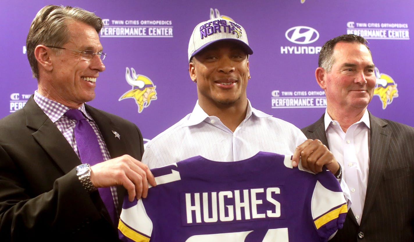 Minnesota Vikings first round pick cornerback Mike Hughes from the University of Central Florida, with Vikings general manager Rick Spielman, left, and Vikings head coach Mike Zimmer, right, was introduced to local media members Friday, April 27, 2018, at the Twin Cities Orthopedics Media Center.] DAVID JOLES &#xef; david.joles@startribune.com Vikings CB Mike Hughes will be introduced at 5:00 p.m. CT on Friday, April 27 at the Twin Cities Orthopedics Media Center.