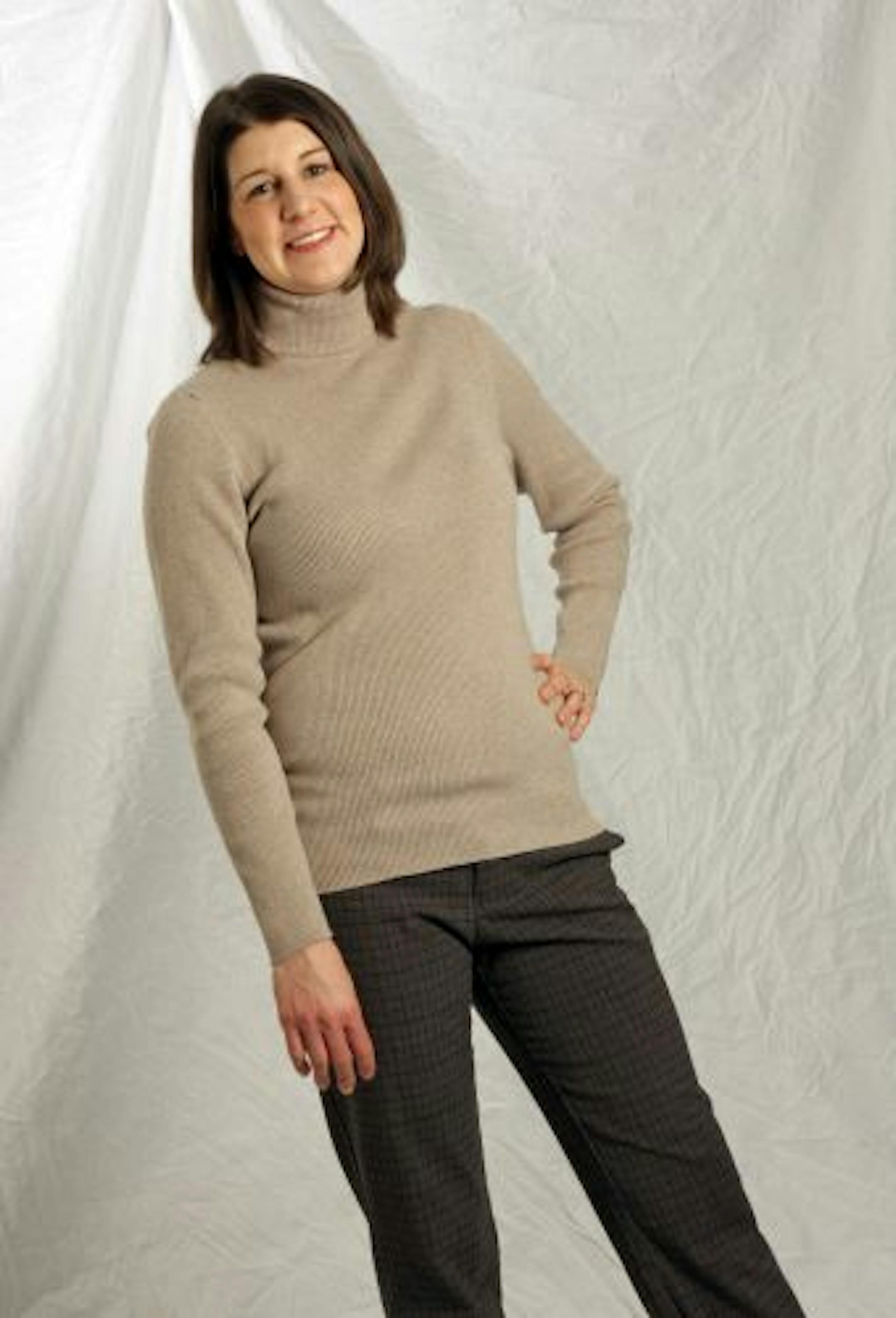 Before: Amanda Roseth, 31, events manager at the Mall of America, is the mother of a 2-year-old and 3-month-old. Her "before" personal style was a ribbed oatmeal colored turtleneck sweater with brown and black plaid pants.