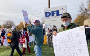 Photo by Katy Read Supporters of President Donald Trump's Supreme Court nominee Judge Amy Coney Barrett rallied Saturday outside DFL headquarters in S