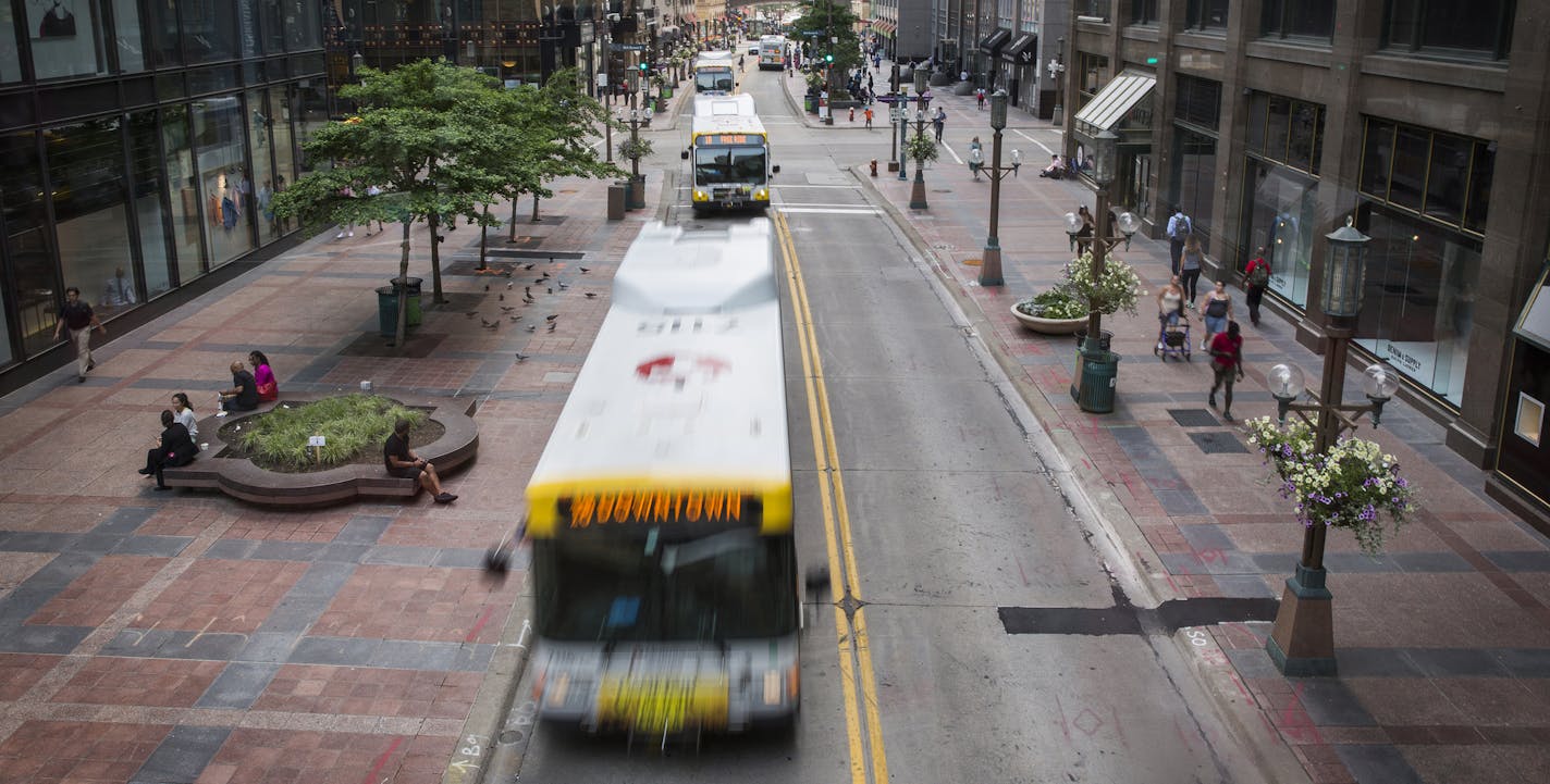 Traffic on Nicollet Mall in downtown Minneapolis seen on Monday, June 29, 2015. ] LEILA NAVIDI leila.navidi@startribune.com / BACKGROUND INFORMATION: Shortly after the Independence Day holiday weekend, crews will close the mall to motor vehicle traffic so they can continue upgrading and relocating the lines for power, gas, telecommunications, sanitary sewer and water beneath the street in advance of the complete mall reconstruction in 2016 and 2017.