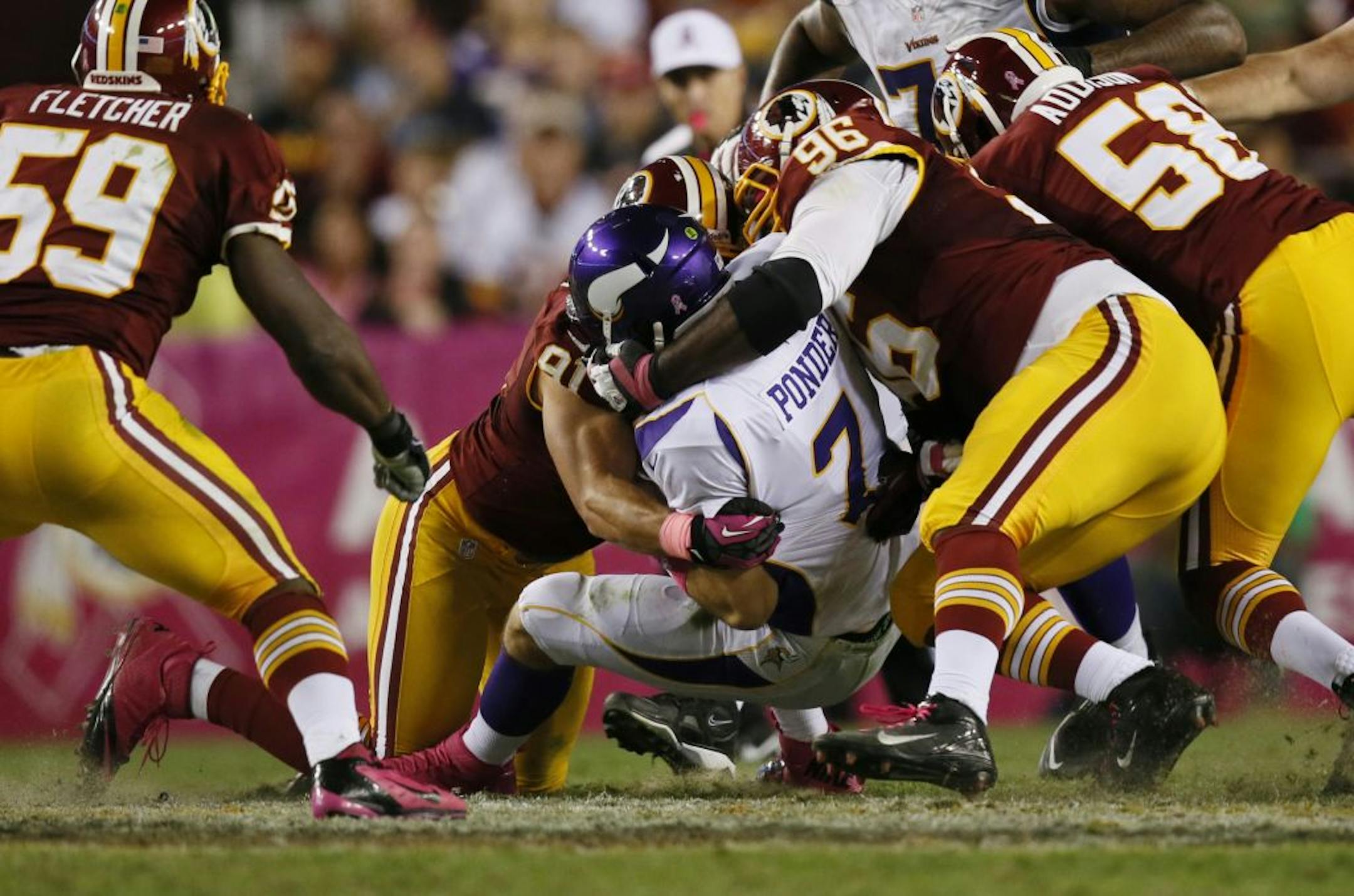 Vikings quarterback Christian Ponder was sacked four times on Sunday, including this double whammy late in the fourth quarter.