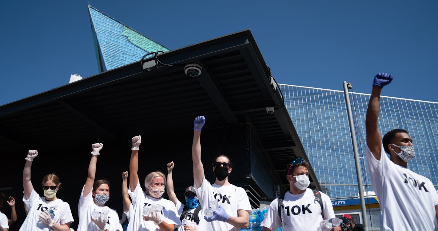 A rally called Unfinished Business, sponsored by the 10K foundation drew crowds starting from USBank Stadium and then marched toward downtown. The group gave out free water to the crowd. ] GLEN STUBBE • glen.stubbe@startribune.com Friday, June 5, 2020