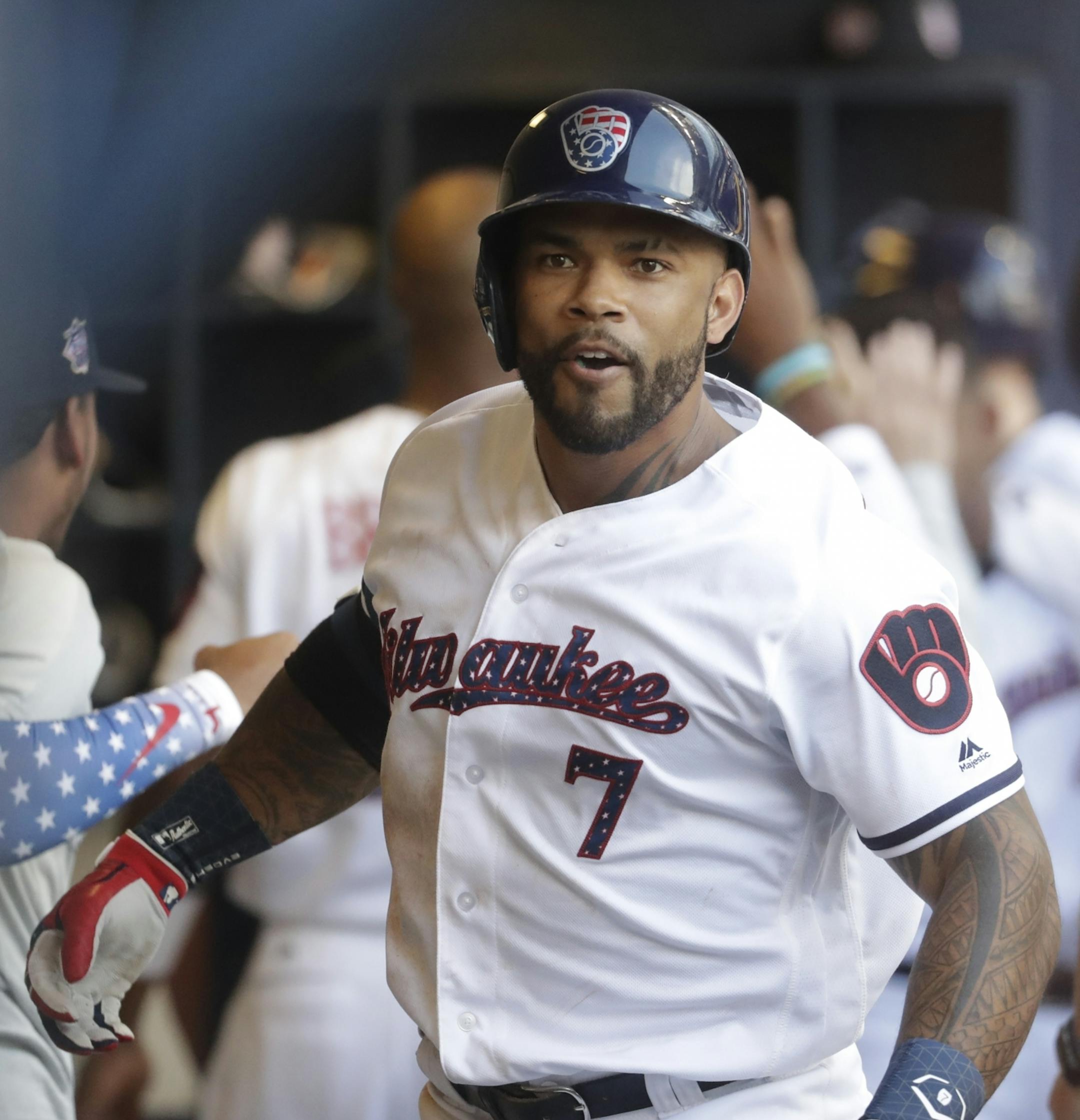 Milwaukee Brewers' Eric Thames celebrates his two-run home run during the fifth inning of a baseball game against the Minnesota Twins Tuesday, July 3, 2018, in Milwaukee.