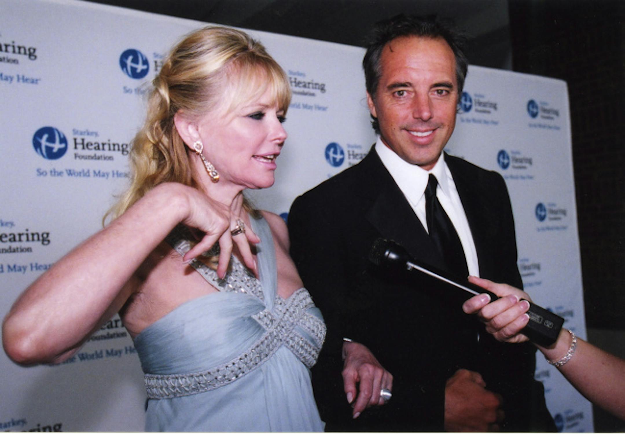 Also on hand were model Cheryl Tiegs and boyfriend Dan Buettner.