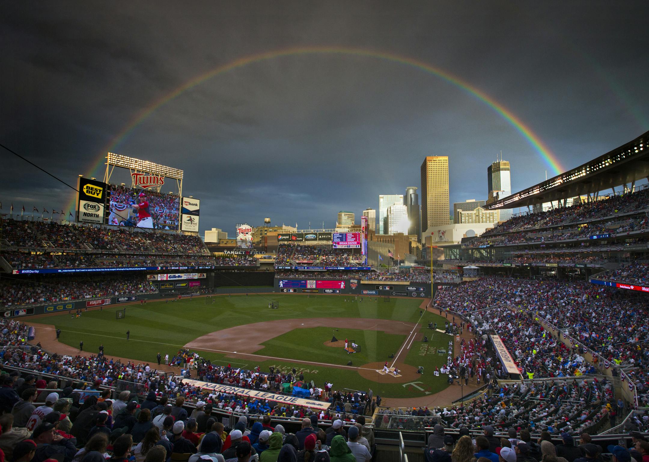 Those that waited out the rain delay were treated to a beautiful rainbow as Twins Brian Dozier took the plate in the Home Run Derby at Target Field. ] 2014 MLB All Star Game, Target Field BRIAN PETERSON ‚Ä¢ brian.peterson@startribune.com Minneapolis, MN 07/14/2014