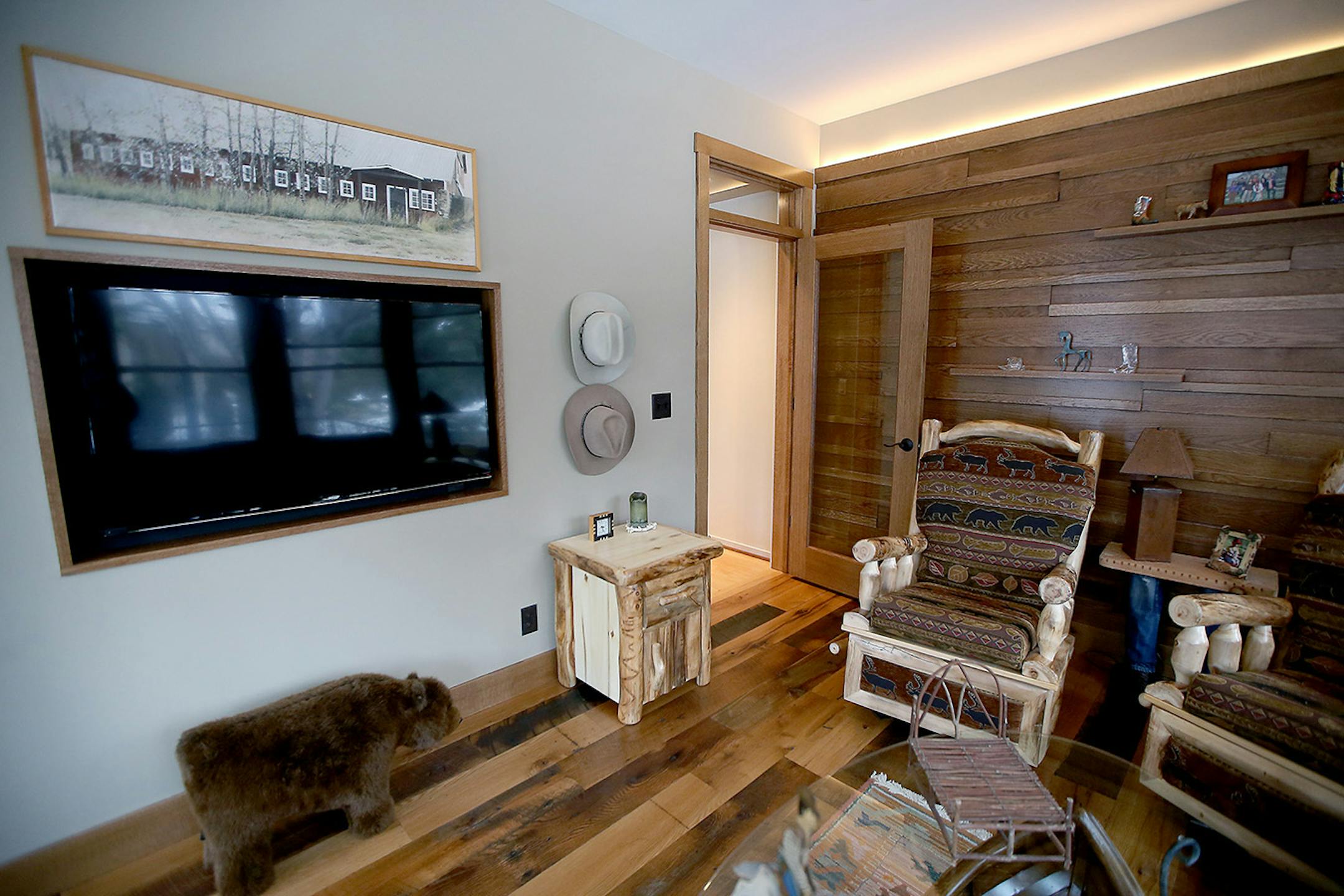 The room now accommodates a recessed TV.
