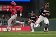 Twins first baseman Donovan Solano (39) fielded a ball in the ninth inning against the Angels on Saturday at Target Field.