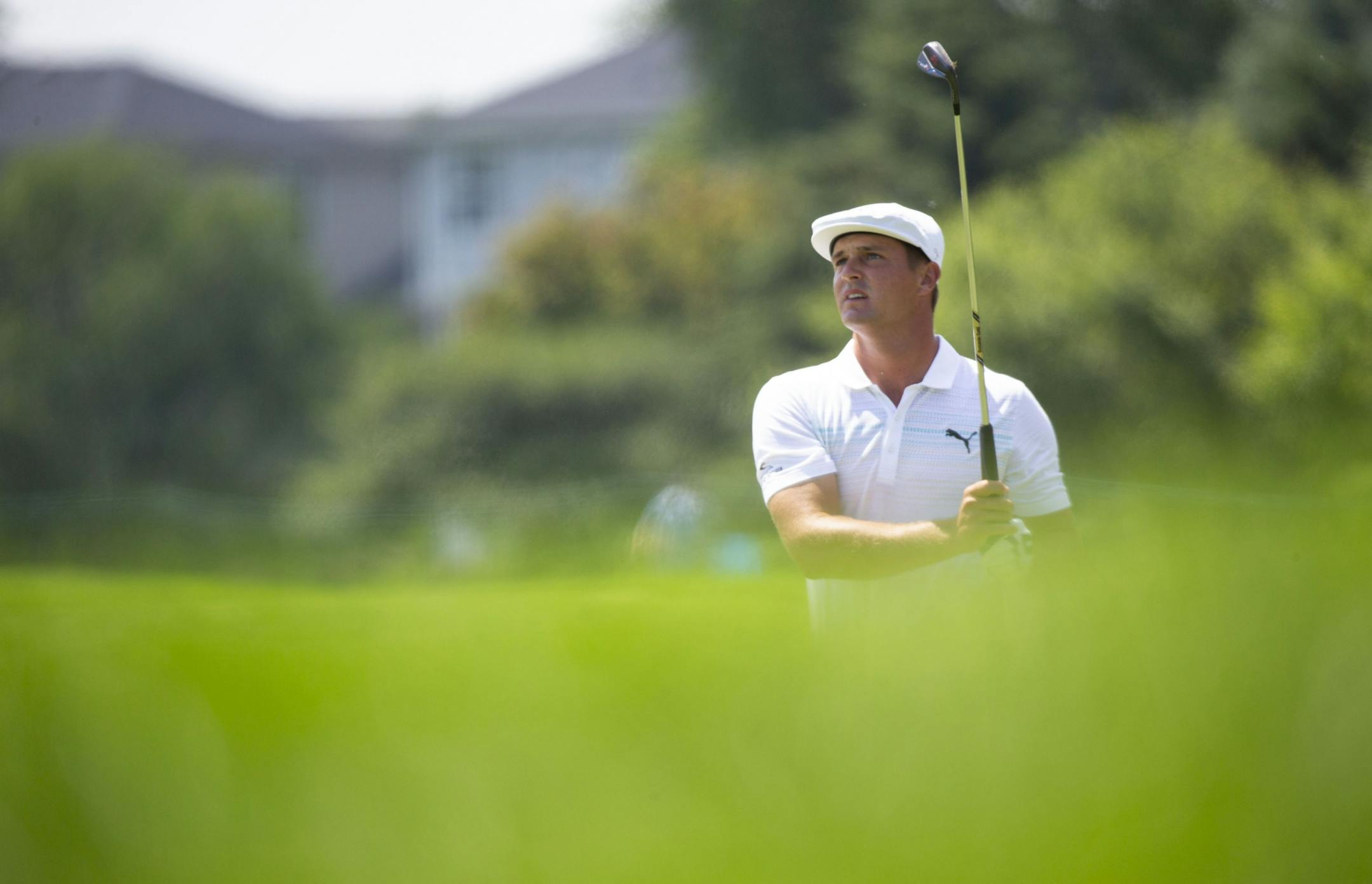Bryson DeChambeau hits a ball on the fairway of the second hole. ALEX KORMANN ¥ alex.kormann@startribune.com Competitors for the 3M Open took to the course on Saturday.