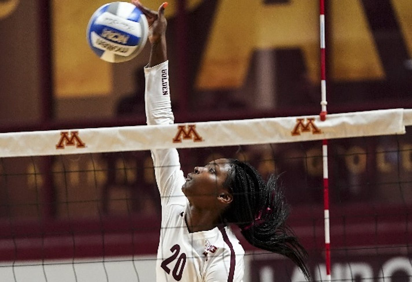 Gophers outside hitter Adanna Rollins (shown in a September match against Penn State) had a team-high 17 kills as the No. 3-ranked Gophers beat No. 5 Wisconsin 16-25, 25-22, 25-19, 25-19 on Wednesday night in Madison and stayed unbeaten in Big Ten volleyball matches.