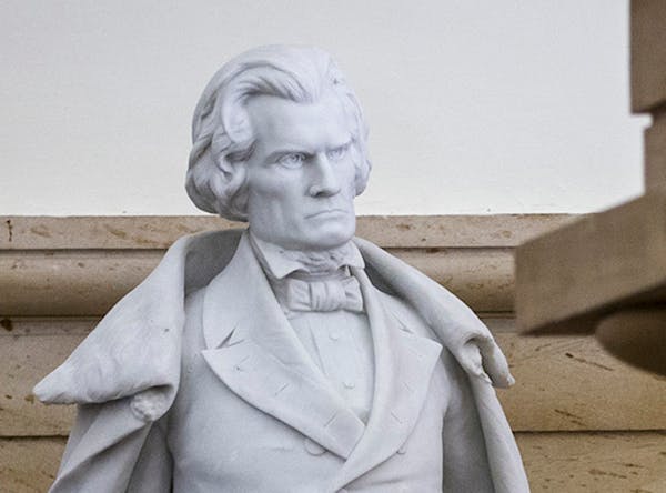 A statue of John C. Calhoun, a pre-Civil War, 19th century South Carolina statesman and slavery supporter, at is pictured at the Capitol building in W