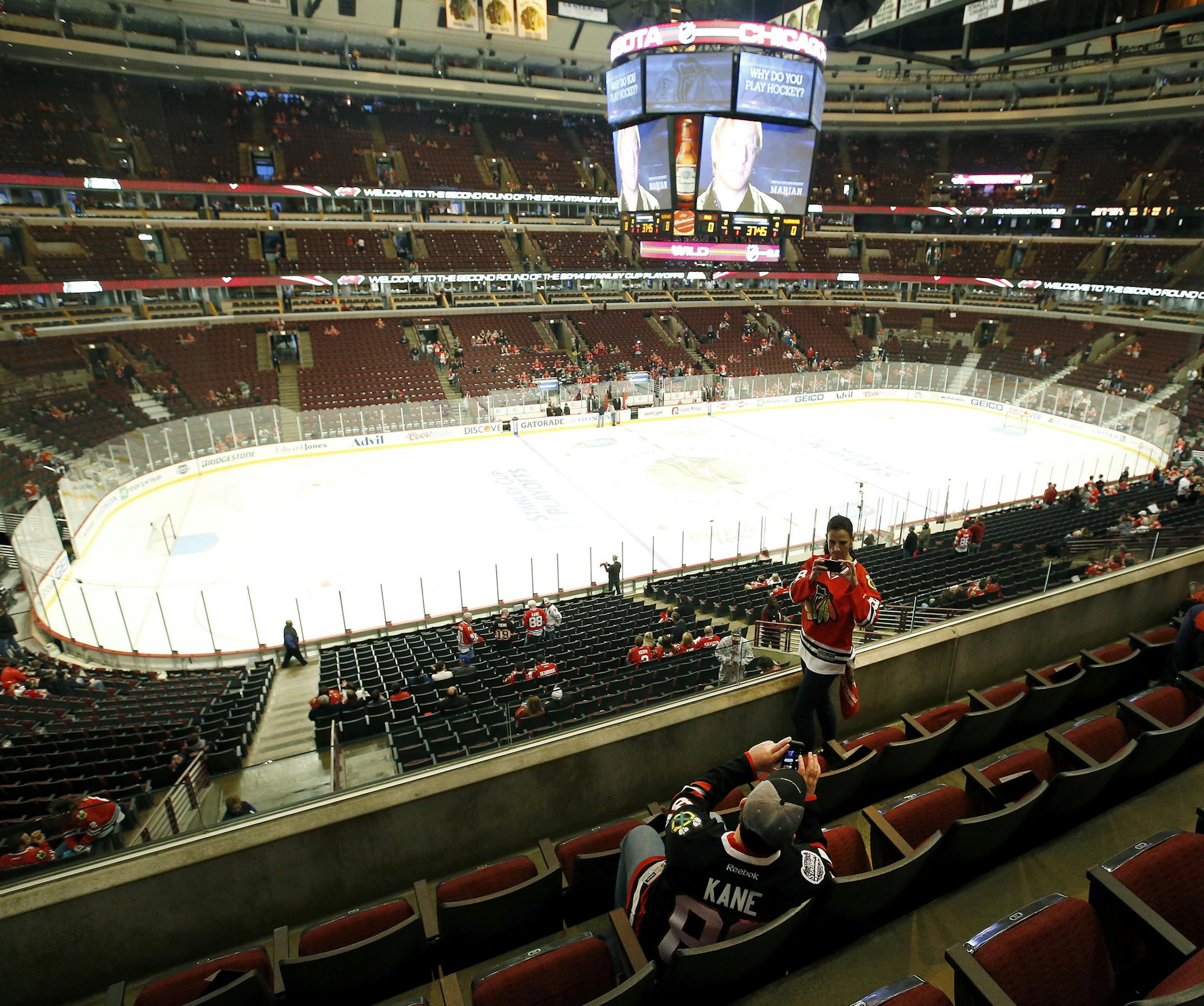 Blackhawks fans took pictures of each other before game 1 between the Minnesota Wild and Chicago Blackhawks at the United Center. ] CARLOS GONZALEZ cgonzalez@startribune.com - May 2, 2014, Chicago, Illinois, United Center, NHL, Minnesota Wild vs. Chicago Blackhawks, Stanley Cup Playoffs Round 2, Game 1