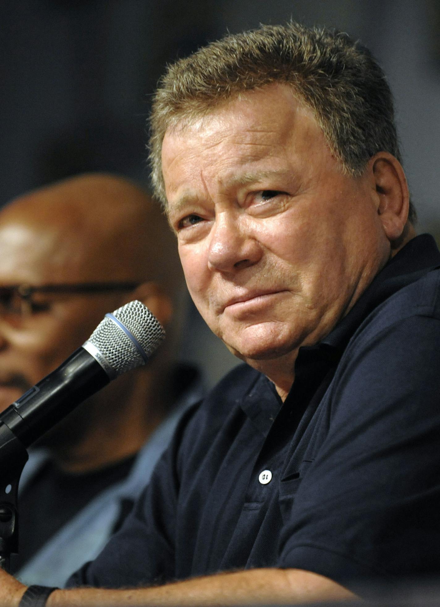 FILE - In this July 22, 2011 file photo, actor William Shatner answers a question during a panel for the movie "The Captains" at the Comic-Con International 2011 convention in San Diego. "Wonder Woman," "Star Trek" and "Aliens" are among the long-running entertainment franchises that will be celebrating milestones at this week's San Diego Comic-Con. The "Star Trek" anniversary will be toasted outside the San Diego Convention on Wednesday evening, July 20, 2016, and the U.S. premiere of "Star Tre