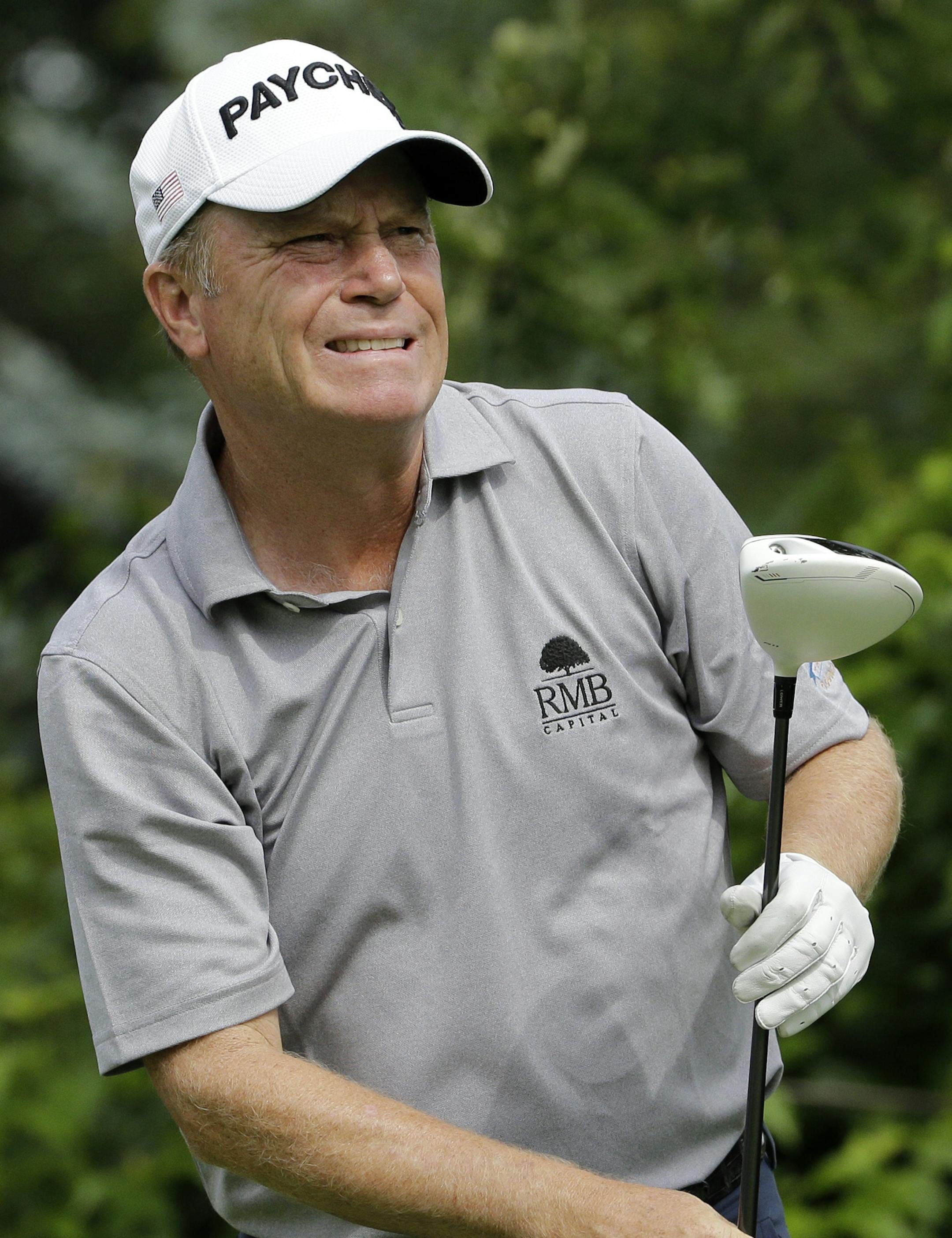 Jeff Sluman reacts as he watches his tee shot on the 11th during the second round of the Encompass Championship golf tournament Saturday, July 11, 2015, in Glenview, Ill. (AP Photo/Nam Y. Huh) ORG XMIT: ILNH107