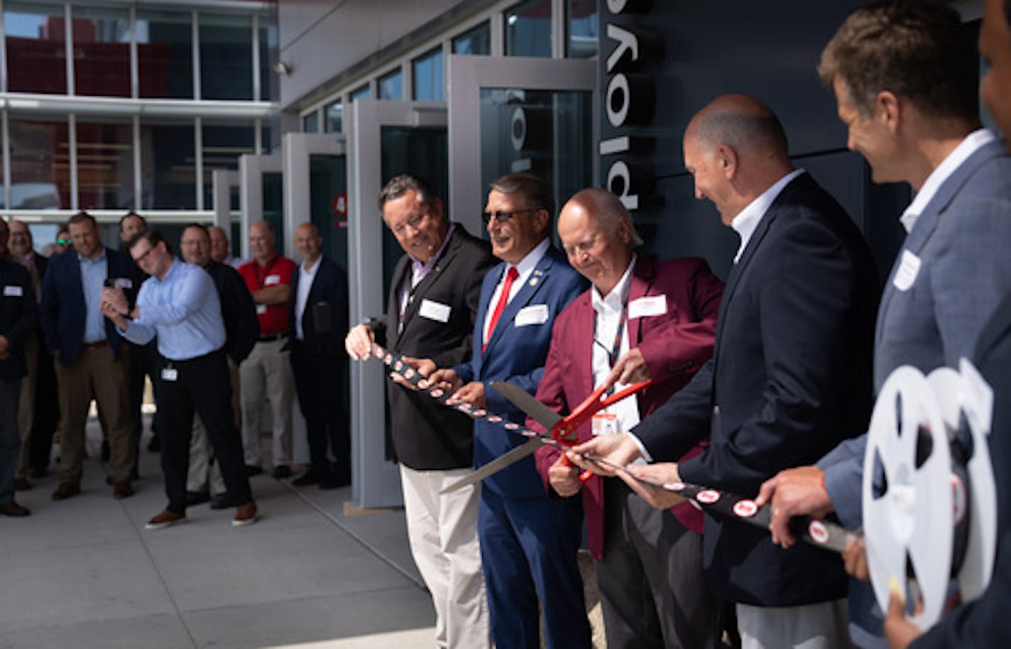 Digi-Key Founder Ronald Stordahl cut a Digi-reel tape during a ribbon cutting ceremony and grand opening for its Product Distribution Center Expansion project (a 2.2 million square foot and $400 million project that began in 2017) on Wednesday, Aug. 17, 2022 in Thief River Falls, Minn. ] RENEE JONES SCHNEIDER • renee.jones@startribune.com