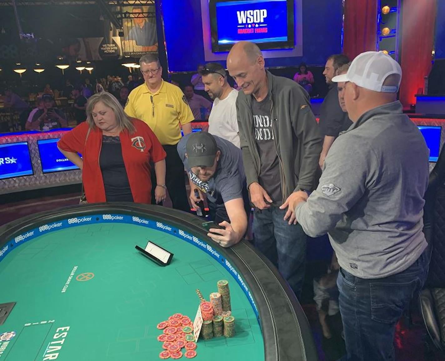 Derek McMaster sported the biggest of smiles as he stood behind his winning stack of chips.