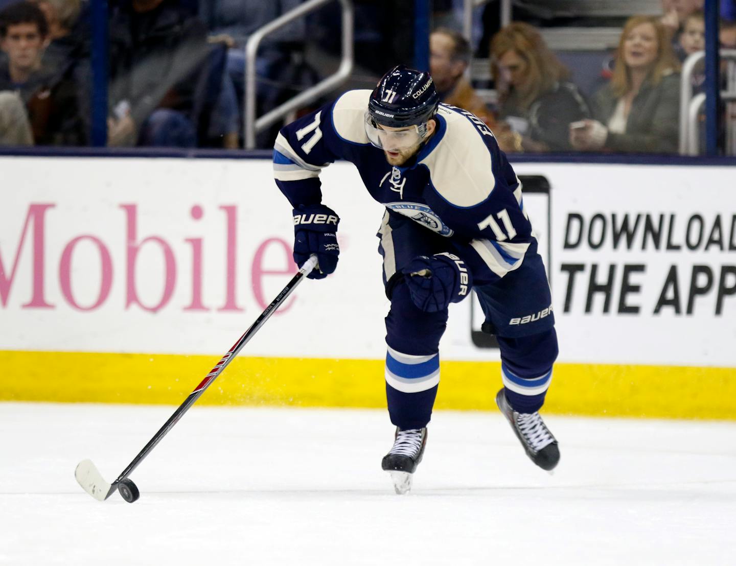 Columbus Blue Jackets' Nick Foligno carries the puck against the Nashville Predators during an NHL hockey game in Columbus, Ohio, Monday, Dec. 22, 2014. (AP Photo/Paul Vernon)