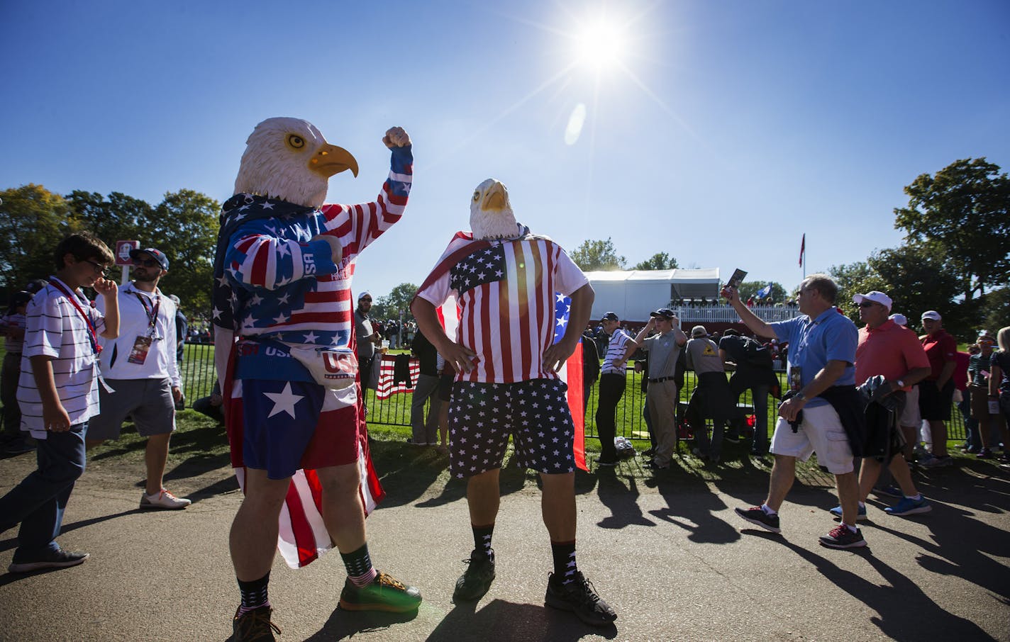 Two American fans sport eagle costumes. ] (Leila Navidi/Star Tribune) leila.navidi@startribune.com BACKGROUND INFORMATION: The Ryder Cup was held on Friday, September 30, 2016 at Hazeltine National Golf Club in Chaska, Minn.