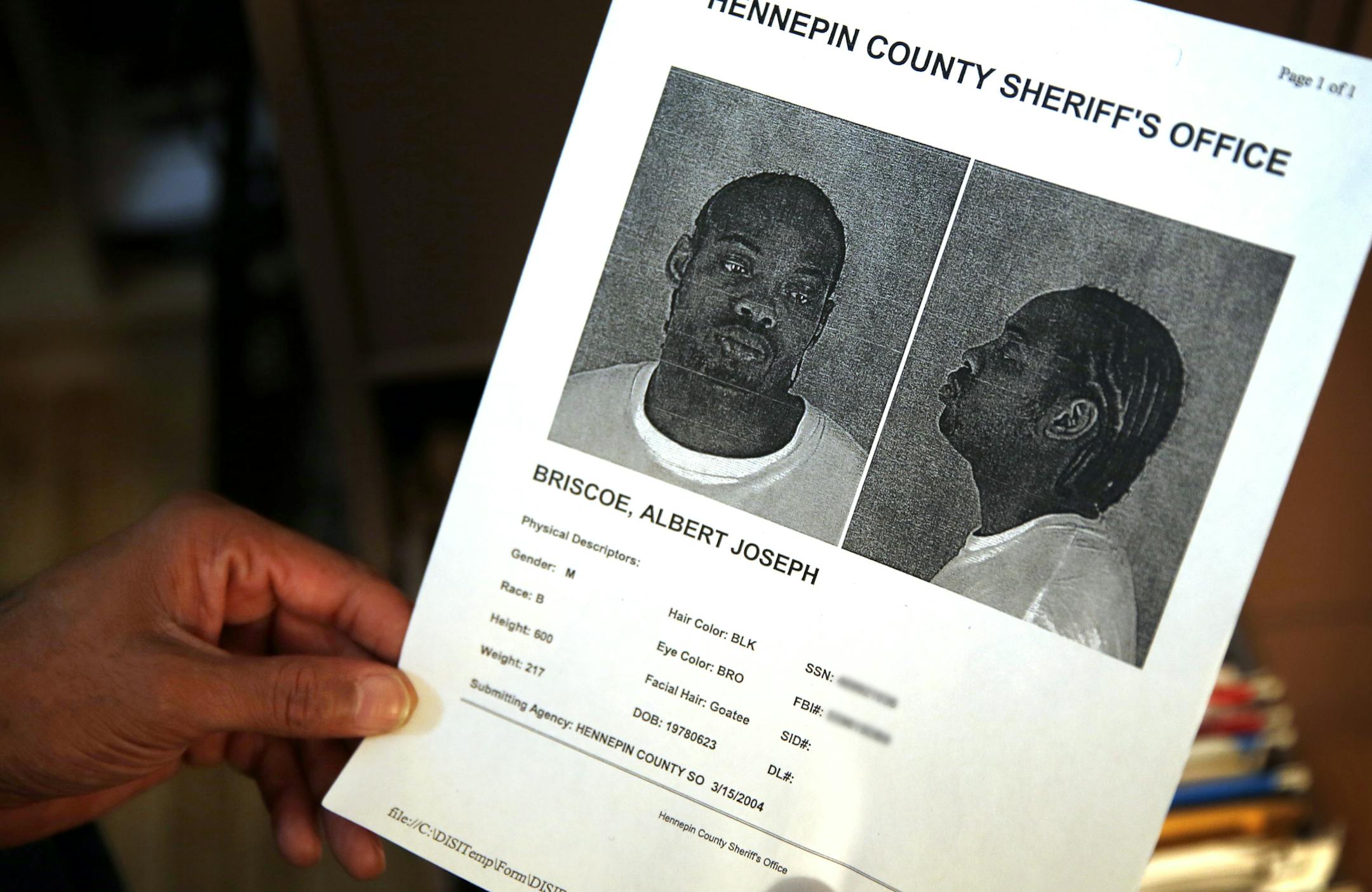 Albert Joseph Briscoe holds one of his booking mugs, this one from Hennepin County in 2004. ] LEILA NAVIDI leila.navidi@startribune.com / BACKGROUND INFO: THE SOCIAL SECURITY NUMBER AND FBI NUMBER HAVE BEEN BLURRED OUT FOR PRIVACY. Friday, October 3, 2014. Albert Joseph Briscoe officially got off parole September, 28, 2014 and has been out of prison since June 2012. Briscoe, a member of the Vice Lords gang, has founded a literacy program called To Succeed You Must Read and has written several bo