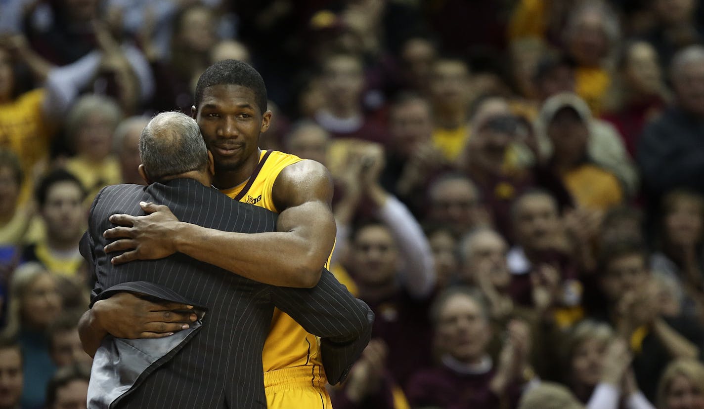 Gophers senior forward Trevor Mbakwe received a hug from coach Tubby Smith after being taken out near the end of the second half at Williams Arena during a 73-44 victory over Penn State on March 2.