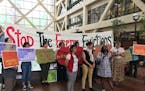 Activists protest in the Hennepin County Government Center after a court hearing for embattled Minneapolis landlord Stephen Frenz on Thursday, June 27