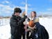 Photo by Erin Adler Rocket team members Eduardo Boeing, Tori LaBonte, Maren Connell and Gabby Edwards get the rocket ready for launching. They attach 