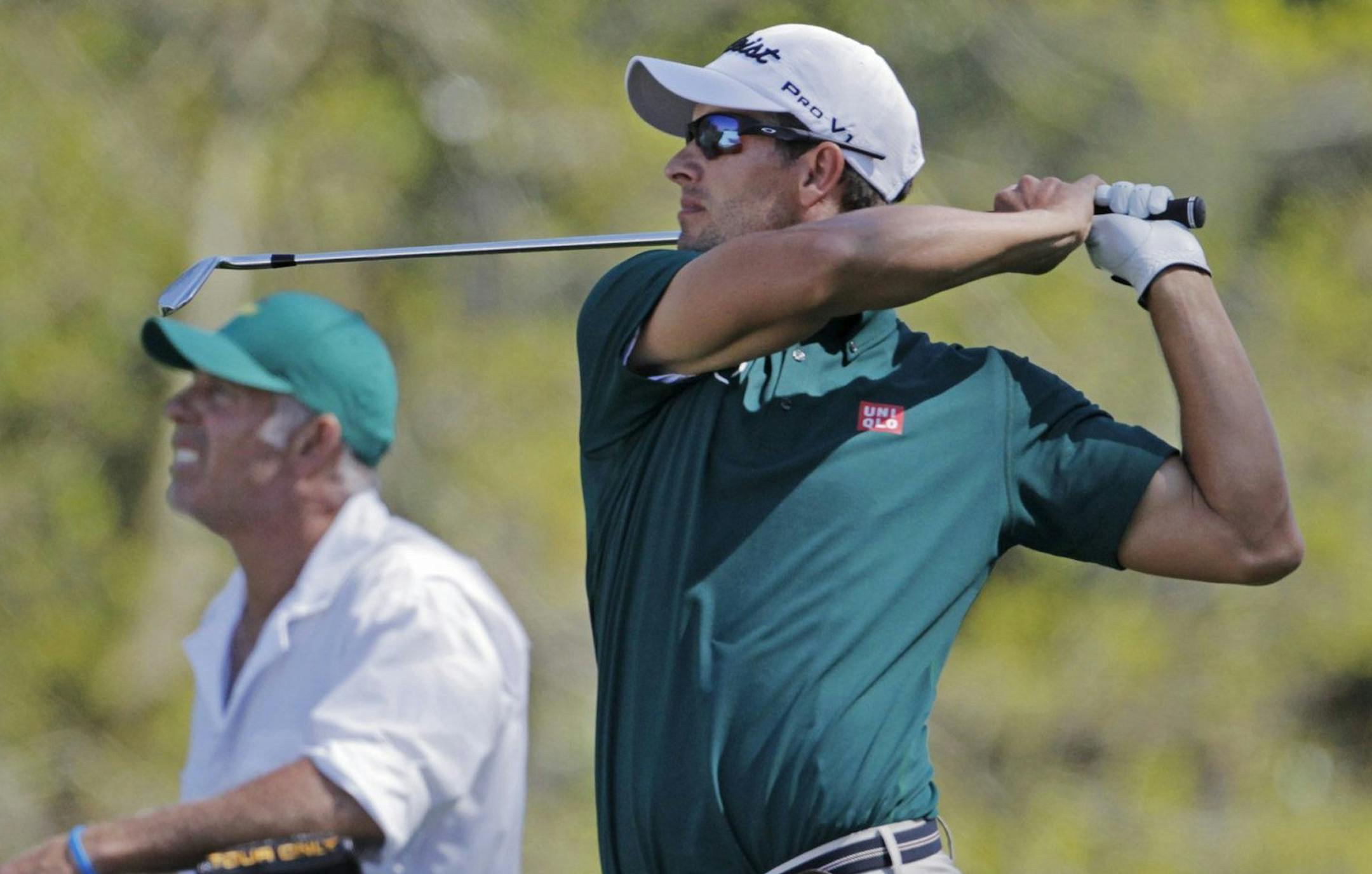 Adam Scott Hits his tee shot on the 18th hole in the first round of the Masters Tournament, Thursday, April 10, 2014, in Augusta, Ga. (Gerry Melendez/The State/MCT)