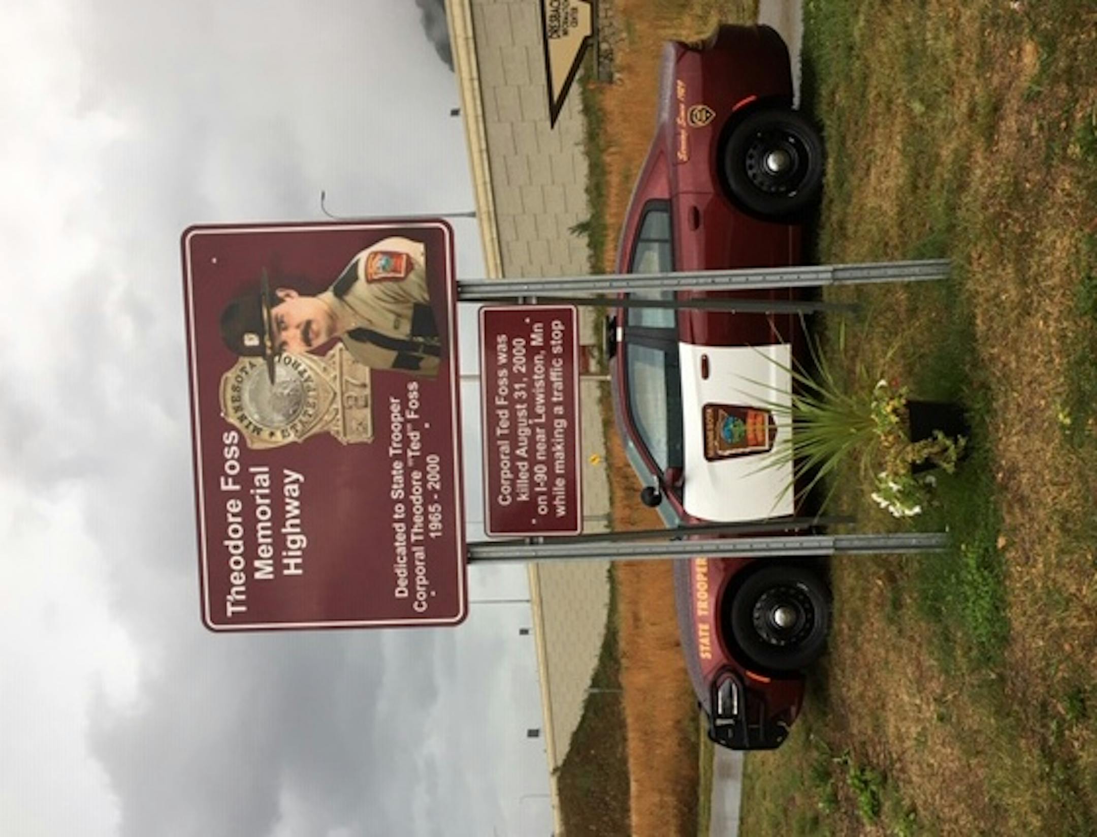 New signs honoring State Trooper Cpl. Theodore "Ted" Foss were installed Monday Aug. 31 at the Dresbach Rest Area on I-90 south of Winona.