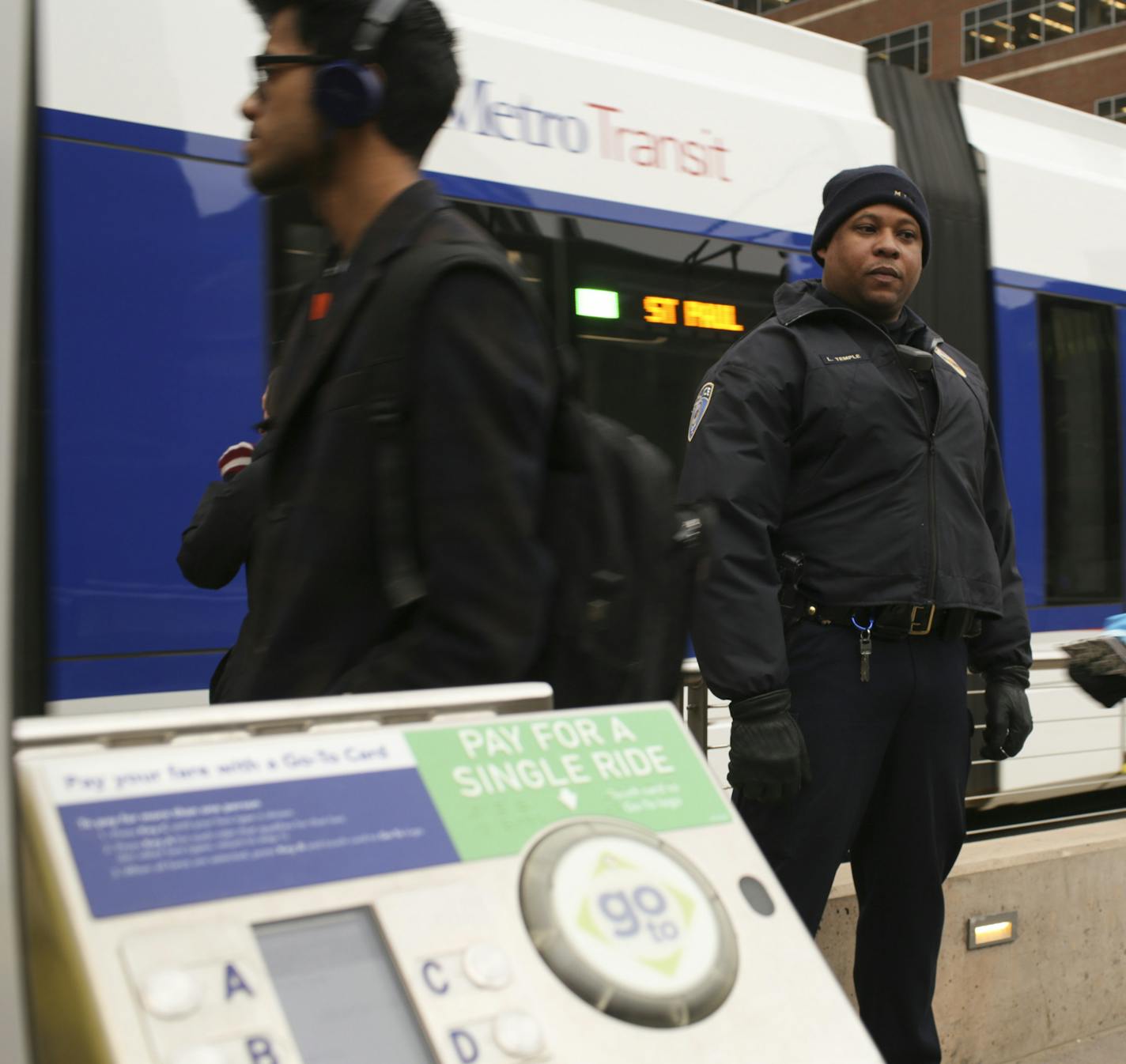 Transit officer LaFayette Temple checked for valid passes or receipts from riders at the East Bank Station Tuesday afternoon in Minneapolis. ] JEFF WHEELER &#x2022; jeff.wheeler@startribune.com A new report shows that light rail fare dodgers cost the Met Council about $28,000 a week in lost revenues. Riders rarely see anyone checking for compliance, but Tuesday afternoon, April 7, 2015 Transit Police were at the East Bank station at the U of M asking for proof of payment.