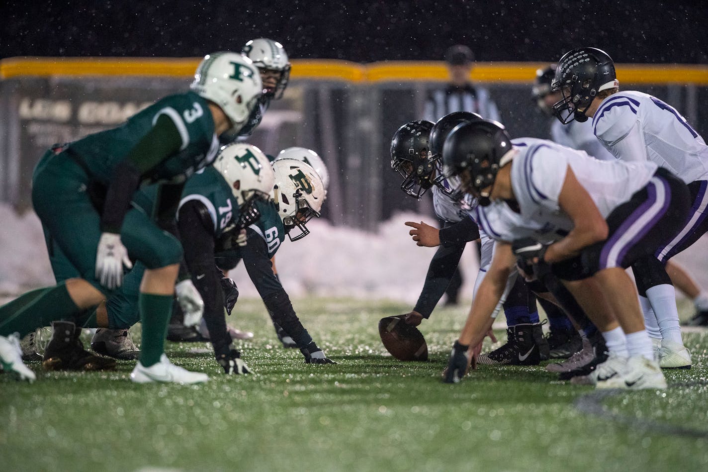 The Proctor defense lined up against the Cloquet offense in the first quarter of the game on Friday. ]