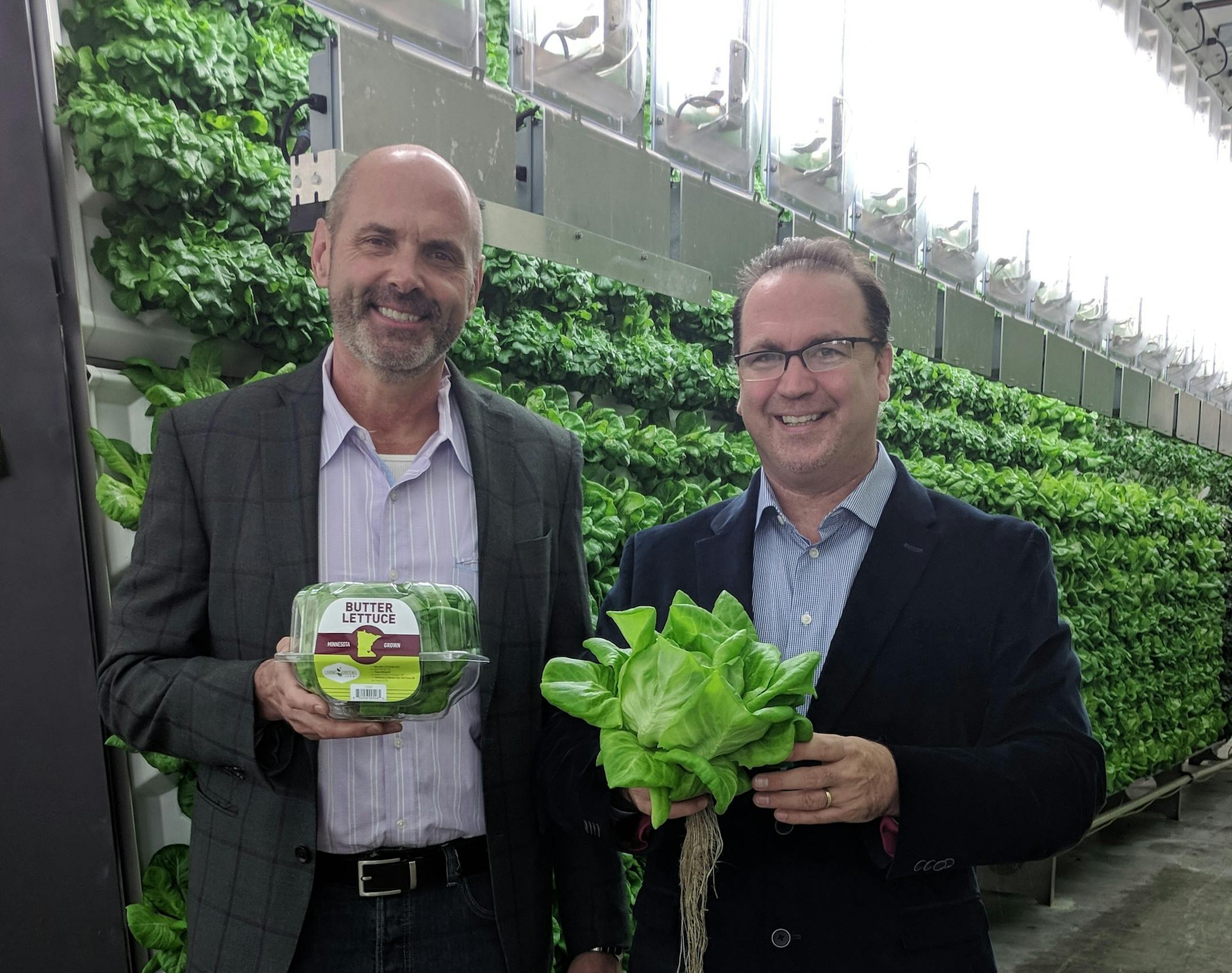 Executives Dave Augustine (left) and Dana Anderson, the founder and CEO of Living Greens Farm of Faribault. ORG XMIT: MIN1810011844066680