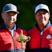 Team USA Captain Davis Love III, left, and Phil Mickelson posed with the Ryder Cup trophy during a team photo session Tuesday morning at Hazeltine Nat