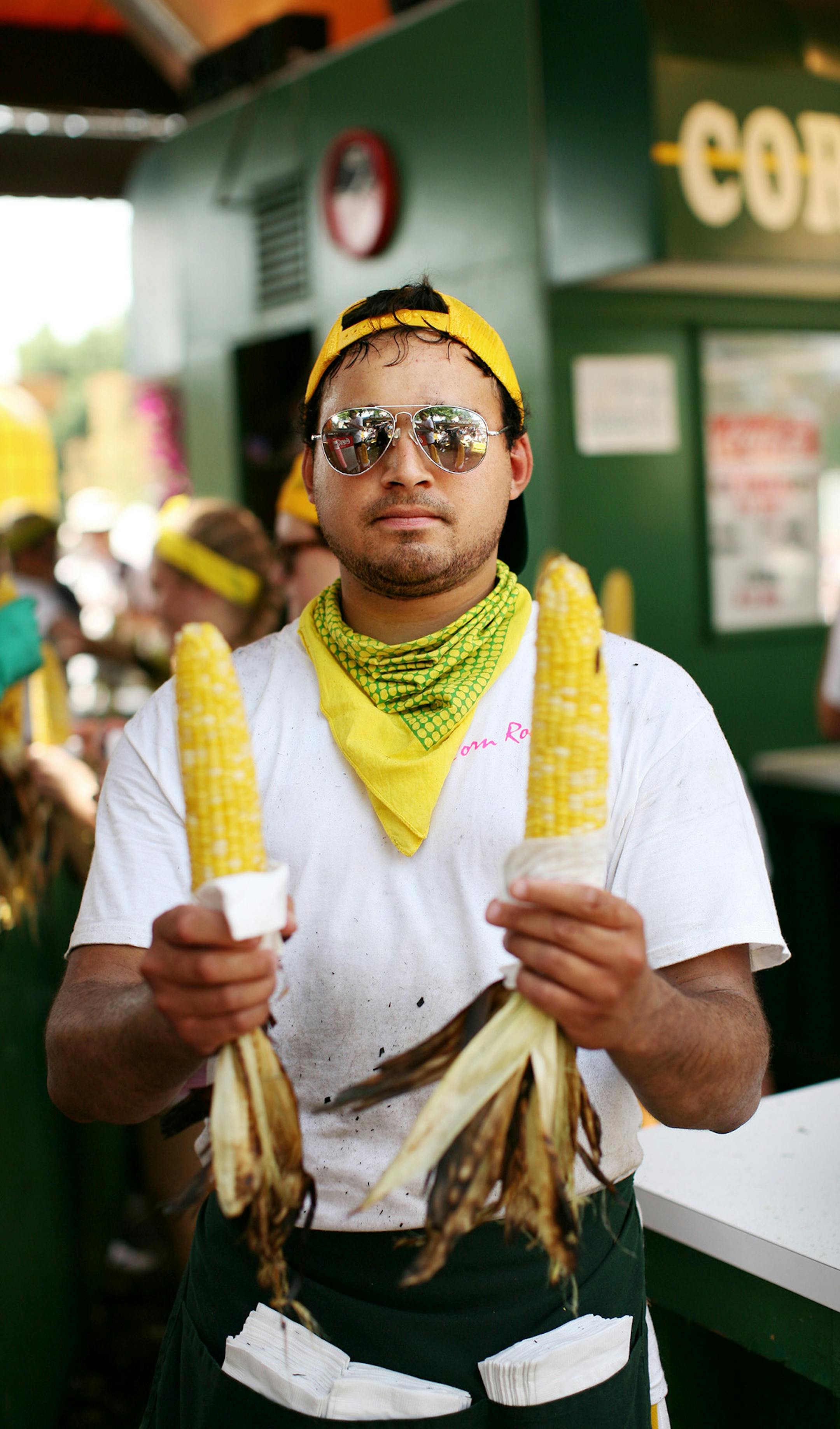 Vinay Pai of Shoreview sells roasted corn at the Minnesota State Fair August 24, 2013. (Courtney Perry) ORG XMIT: MIN1308251409336620