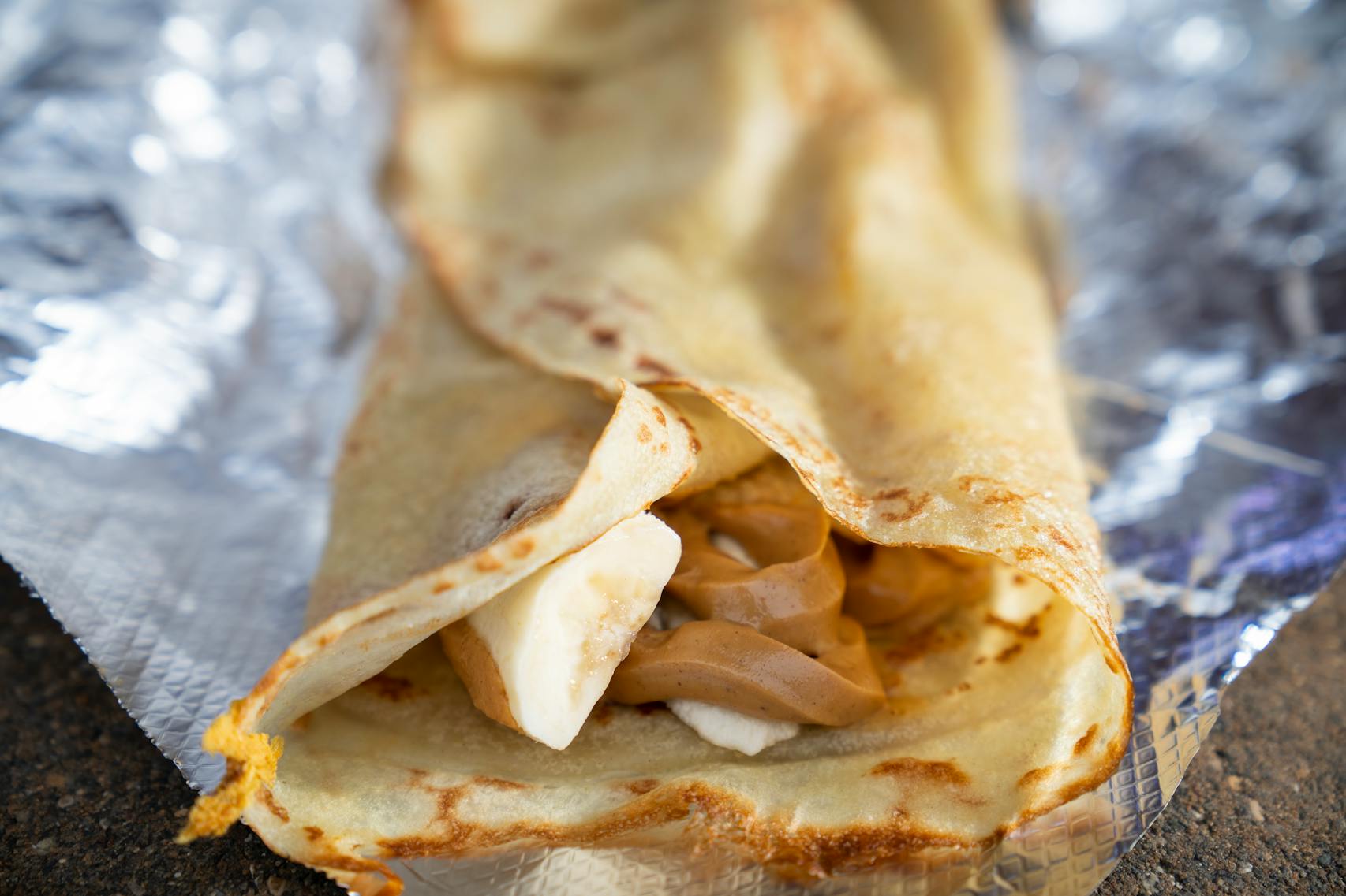Peanut Butter Banana Crepe from French Creperie. The new foods of the 2023 Minnesota State Fair photographed on the first day of the fair in Falcon Heights, Minn. on Tuesday, Aug. 8, 2023. ] LEILA NAVIDI • leila.navidi@startribune.com