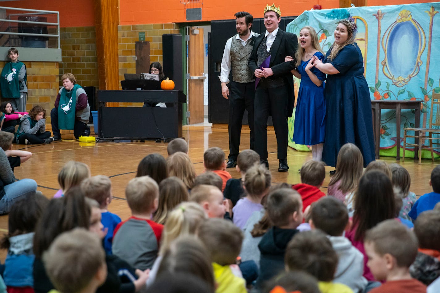 (From Left) Luke Williams, Wesley Frye, Madison Holtze and Sadie Cheslak sang the final song of the performance together in front of students from Cherry School.