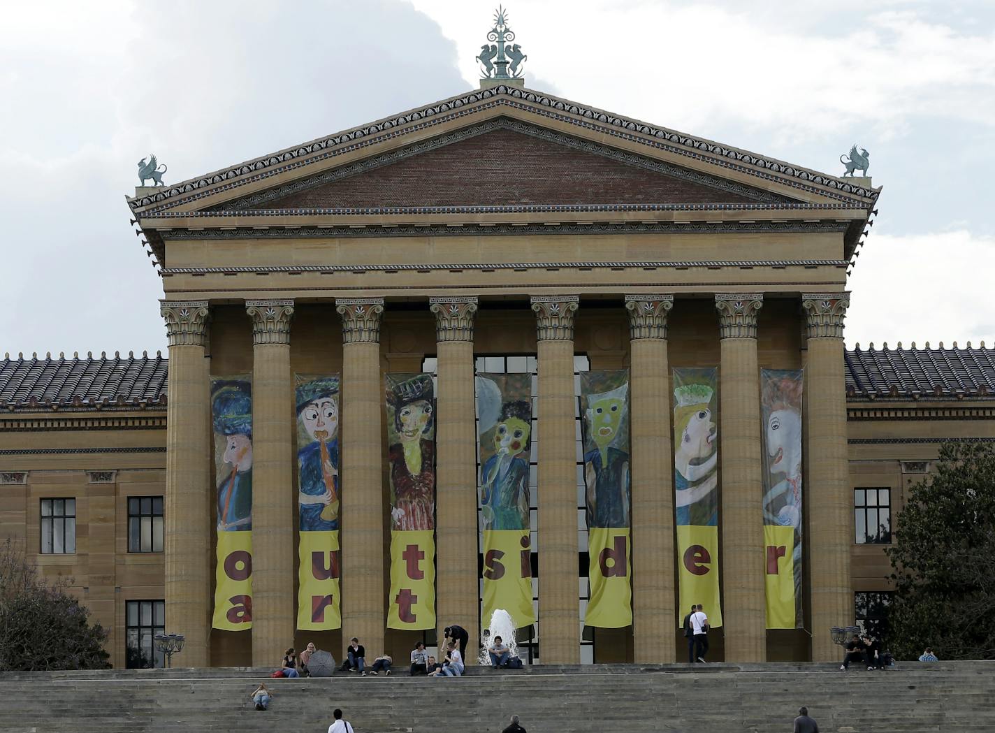 In this Wednesday, May 8, 2013 photo visitors climb the steps of the Philadelphia Museum of Art in Philadelphia. The City of Brotherly Love is perhaps best known for its Colonial roots but locals will tell you there's much more to explore in this city of 1.5 million people. (AP Photo/Matt Rourke, File)