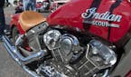 A group of motorcycle fans and potential buyers looked over a batch of Indian motorcycles. ] Indian Motorcycles of the Twin Cities is the 1st dealer i